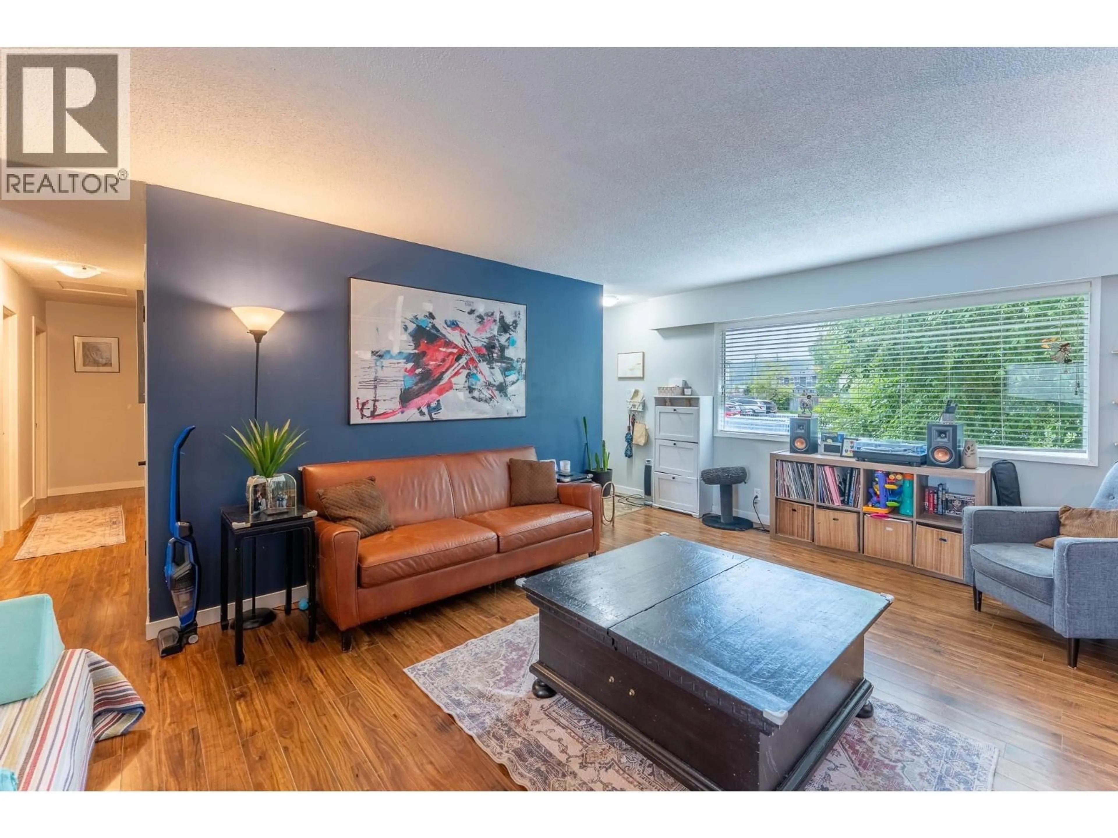 Living room with furniture, wood/laminate floor for 112 MCQUEEN CRESCENT, Prince George British Columbia V2M4R8
