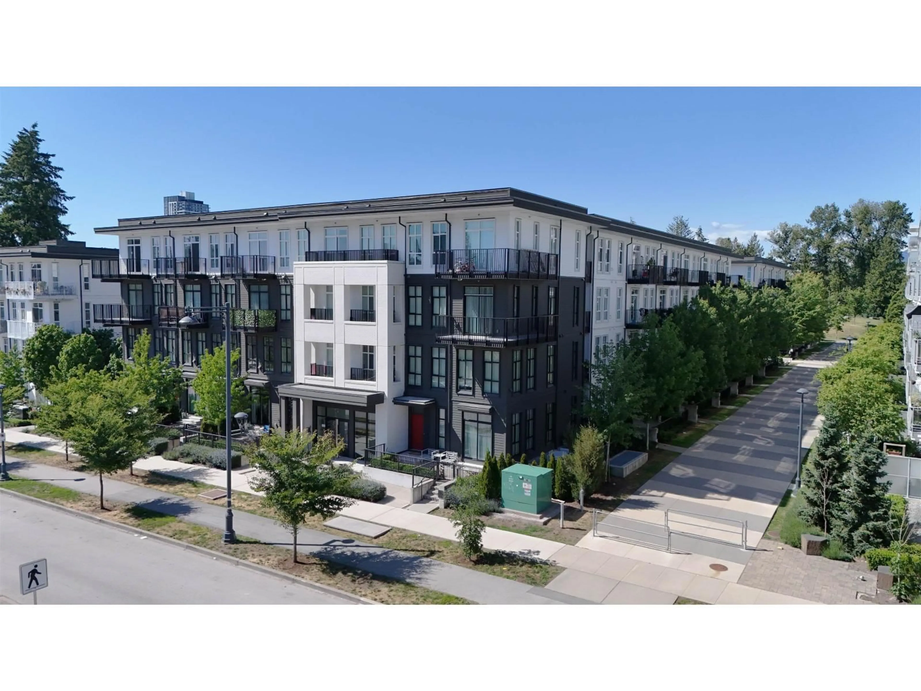 A pic from outside/outdoor area/front of a property/back of a property/a pic from drone, building for 304 - 13963 105 BOULEVARD, Surrey British Columbia V3T0M9