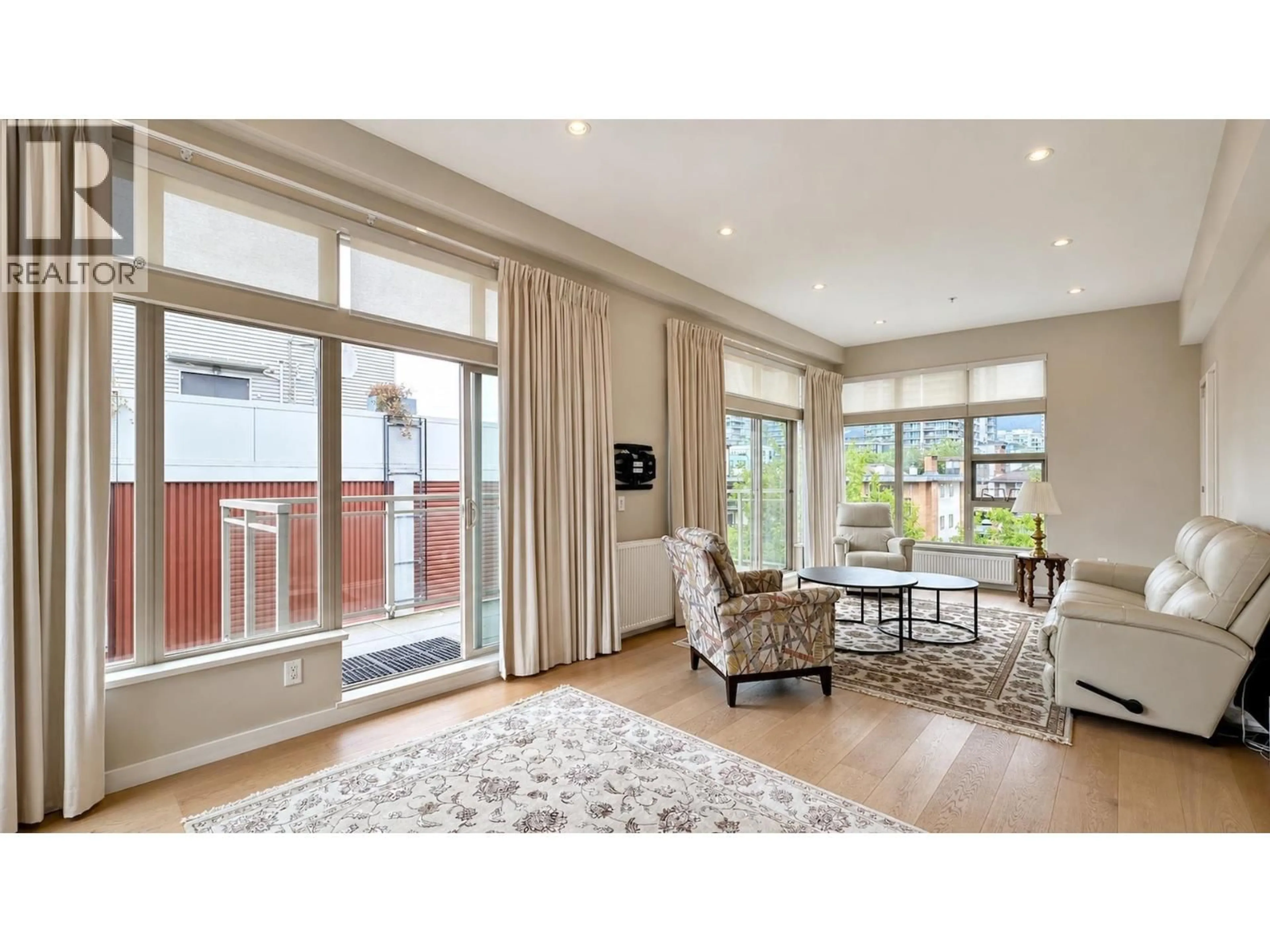 Living room with furniture, wood/laminate floor for PH2 - 1033 ST. GEORGES AVENUE, North Vancouver British Columbia V7L3H5