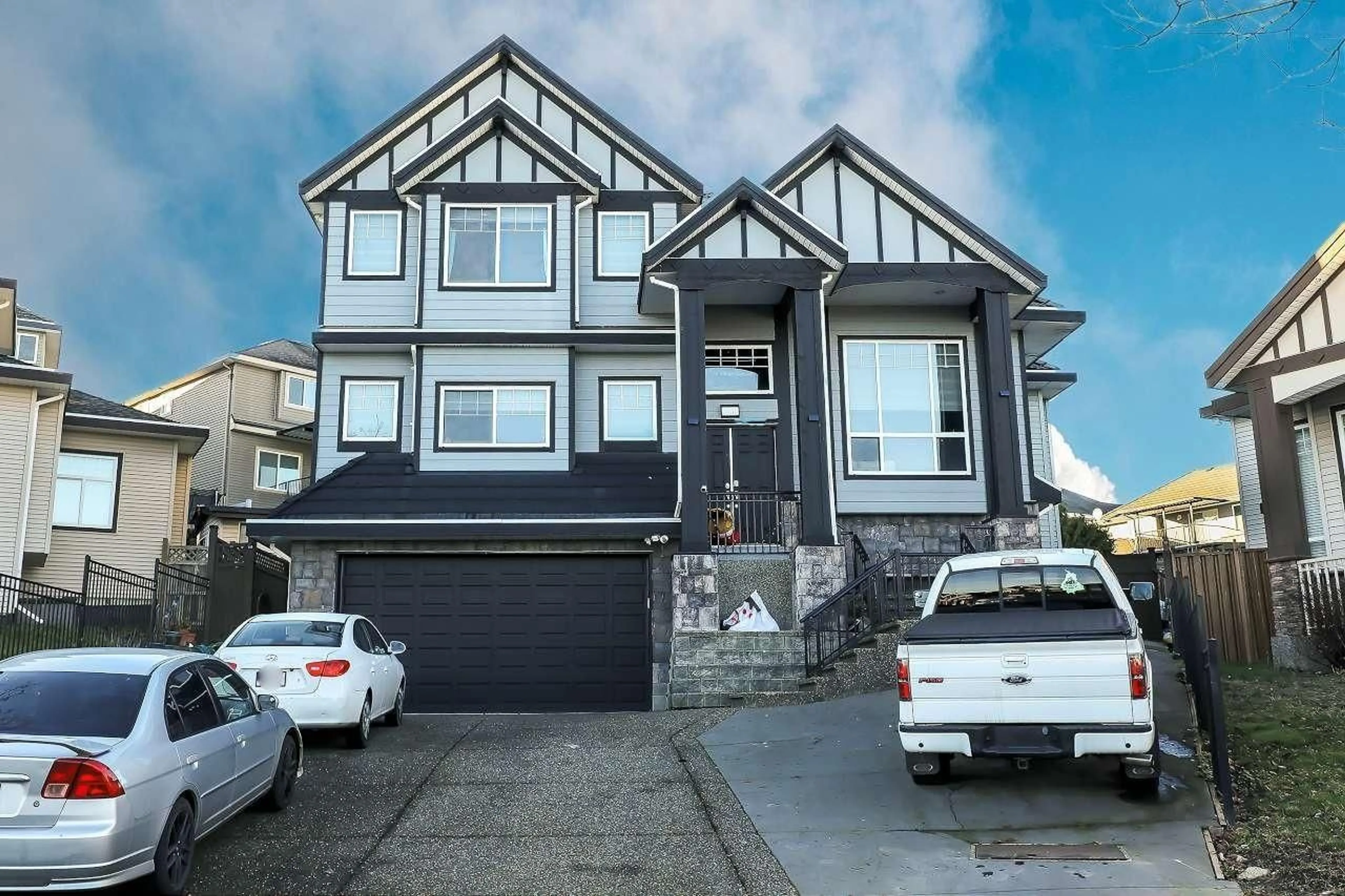 Home with vinyl exterior material, street for 7171 151 STREET, Surrey British Columbia V3S7Y8
