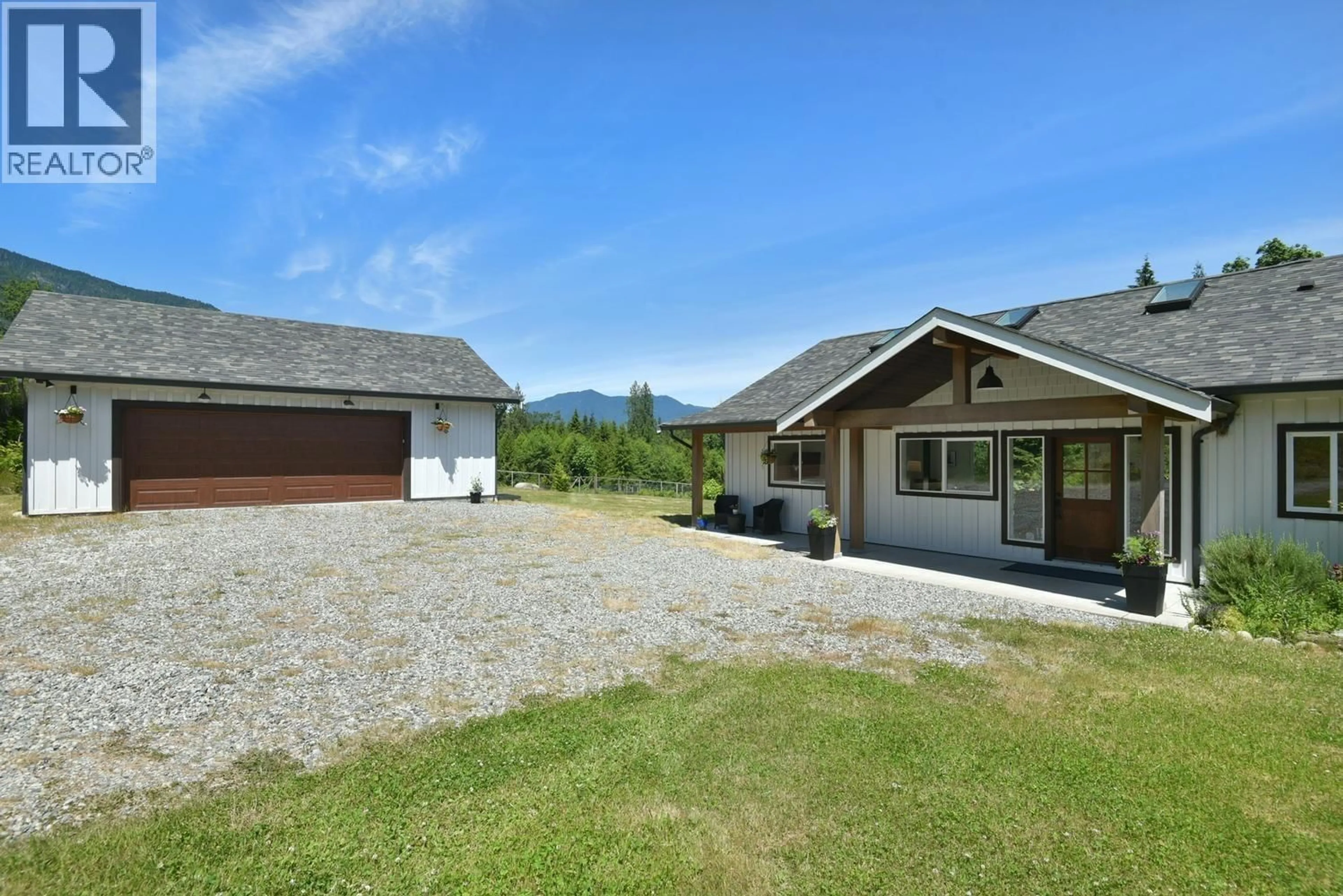 A pic from outside/outdoor area/front of a property/back of a property/a pic from drone, mountain view for 1860 ARBORETUM DRIVE, Gibsons British Columbia V0N1V6