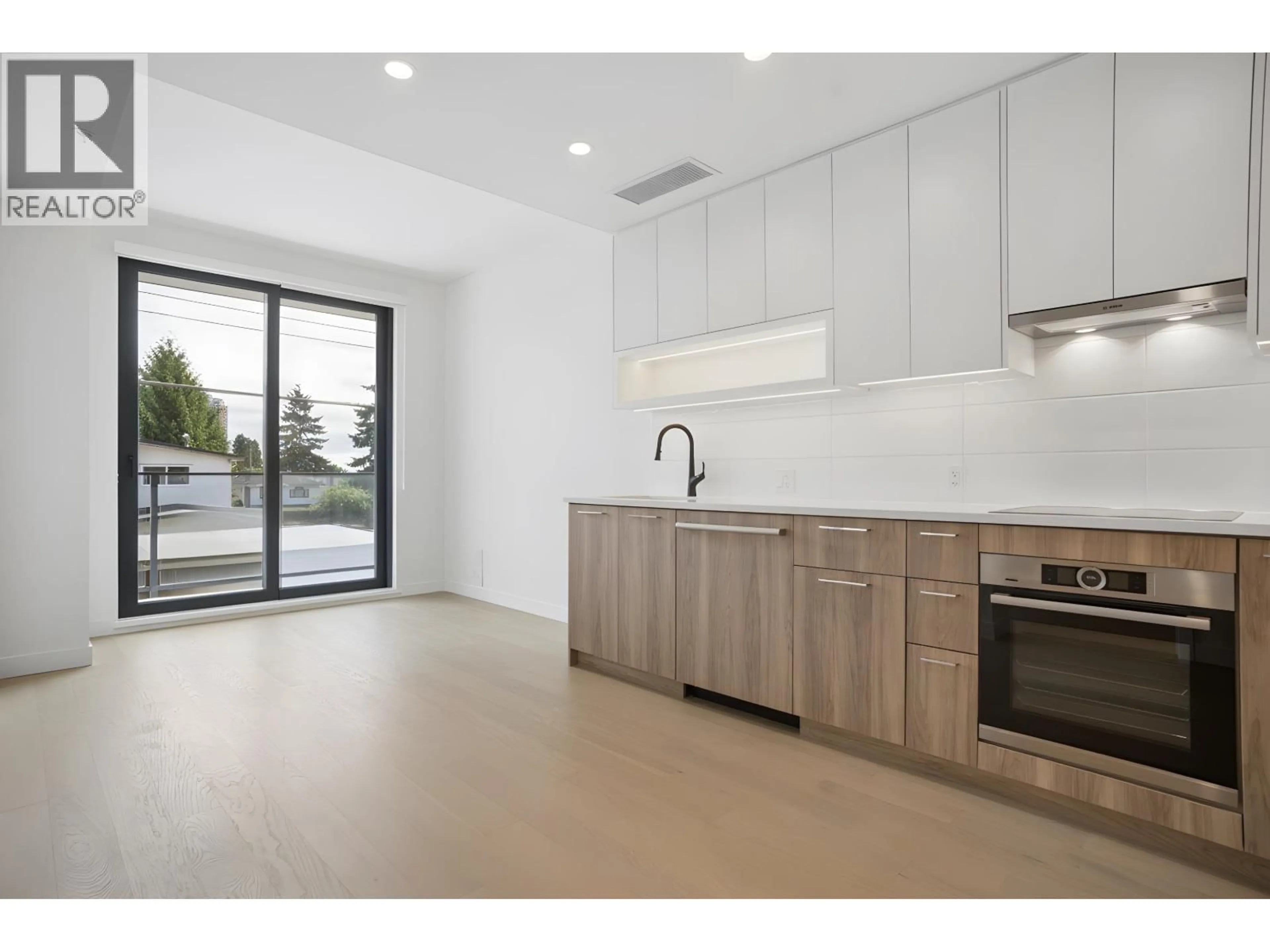 Open concept kitchen, unknown for 202 - 8398 OAK STREET, Vancouver British Columbia V6P0L9
