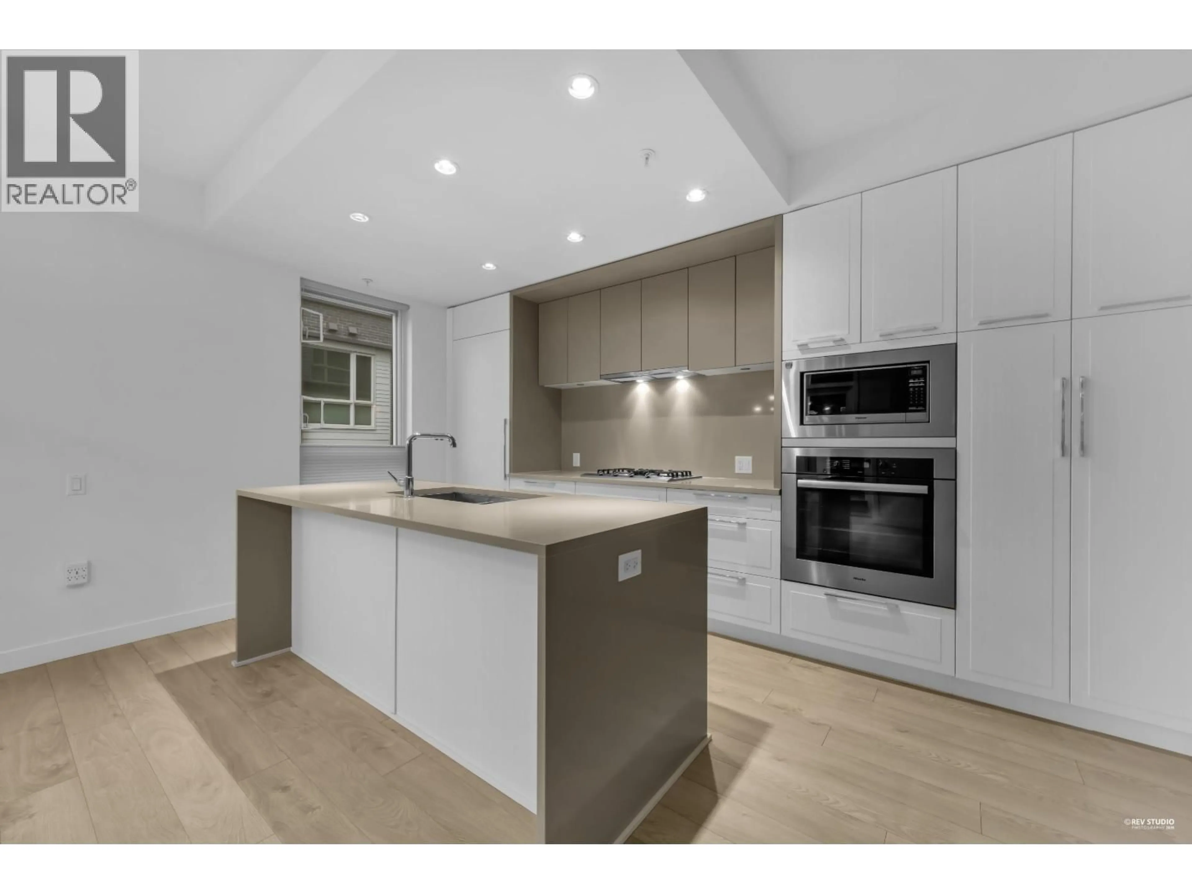Open concept kitchen, unknown for 109 - 6677 CAMBIE STREET, Vancouver British Columbia V6P0E6