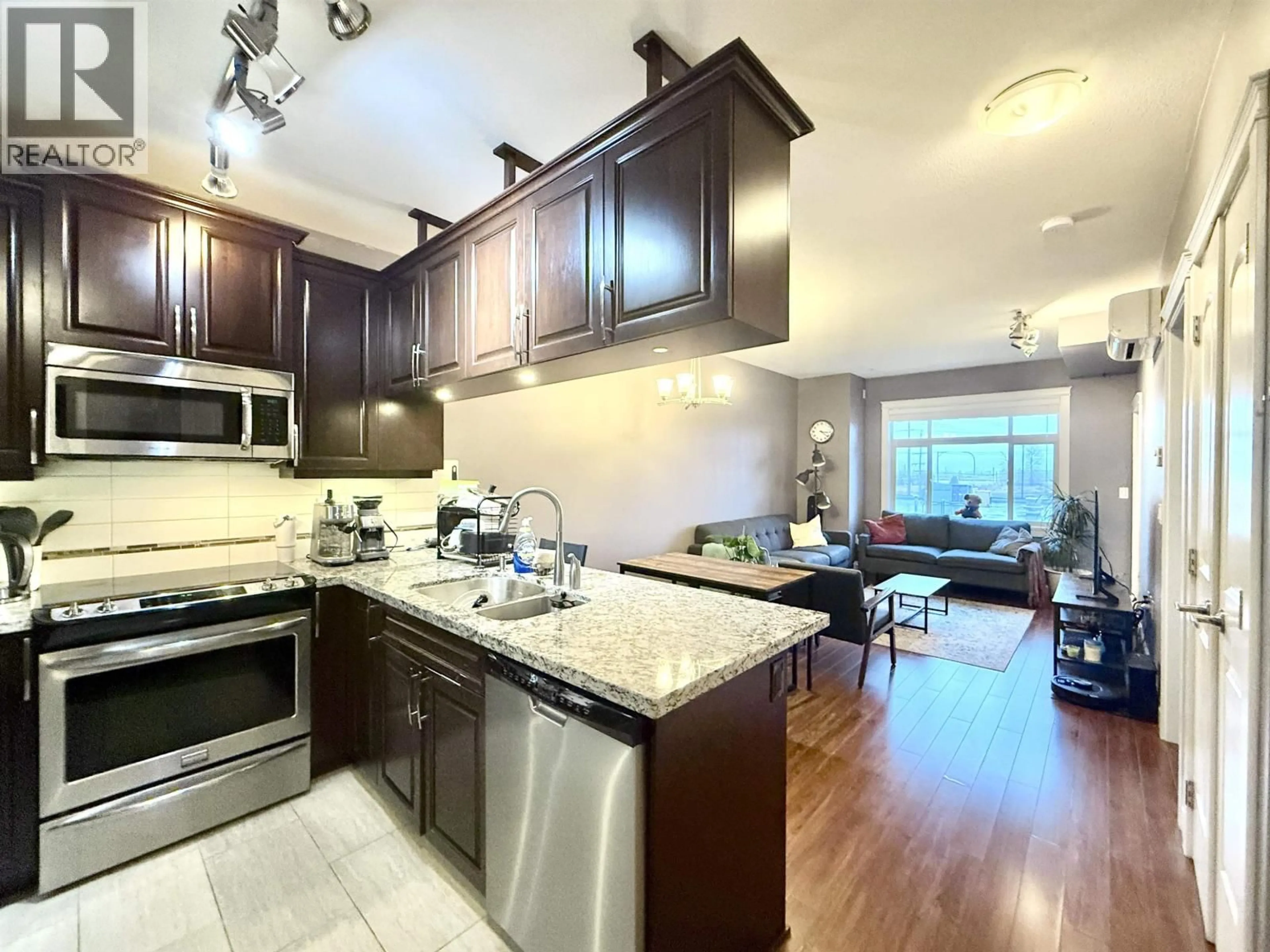Open concept kitchen, ceramic/tile floor for 209 - 12655 190A STREET, Pitt Meadows British Columbia V3Y0E9