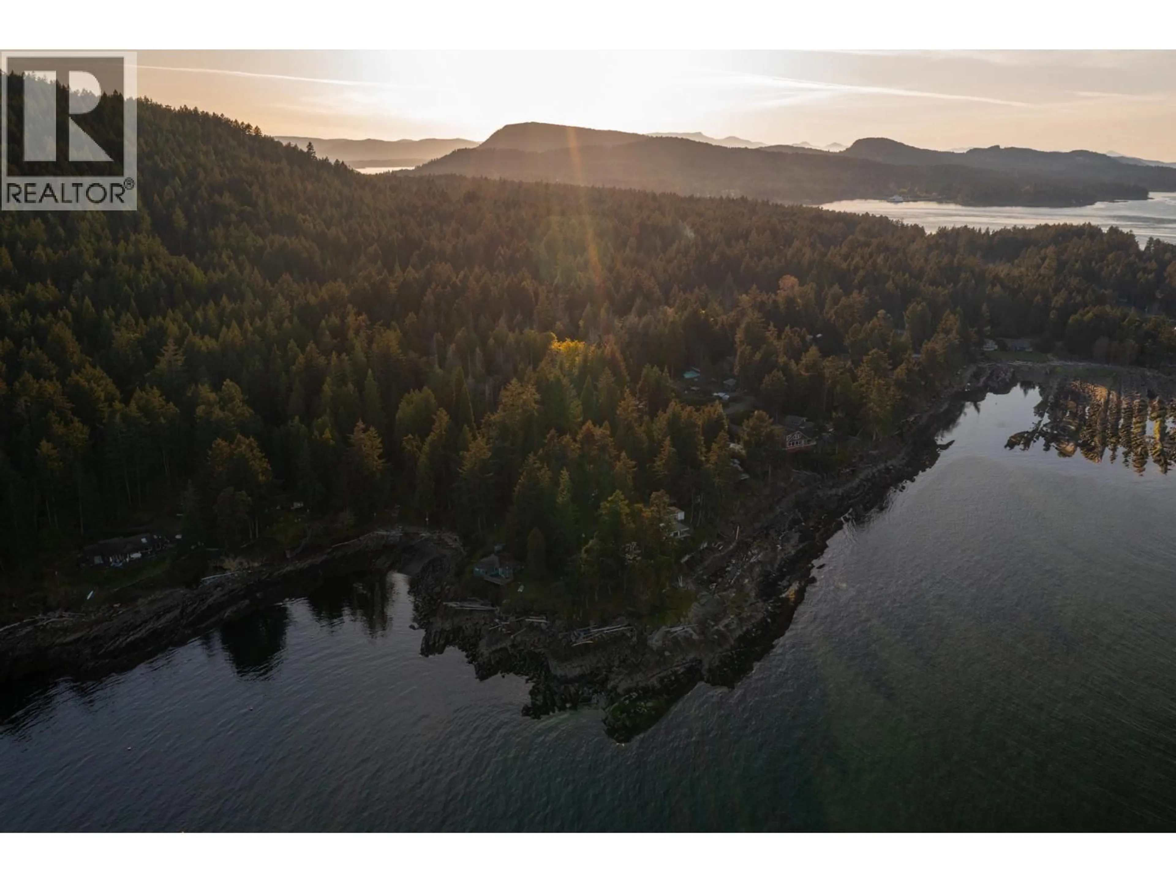 A pic from outside/outdoor area/front of a property/back of a property/a pic from drone, water/lake/river/ocean view for 579 BAYVIEW DRIVE, Mayne Island British Columbia V0N2J1