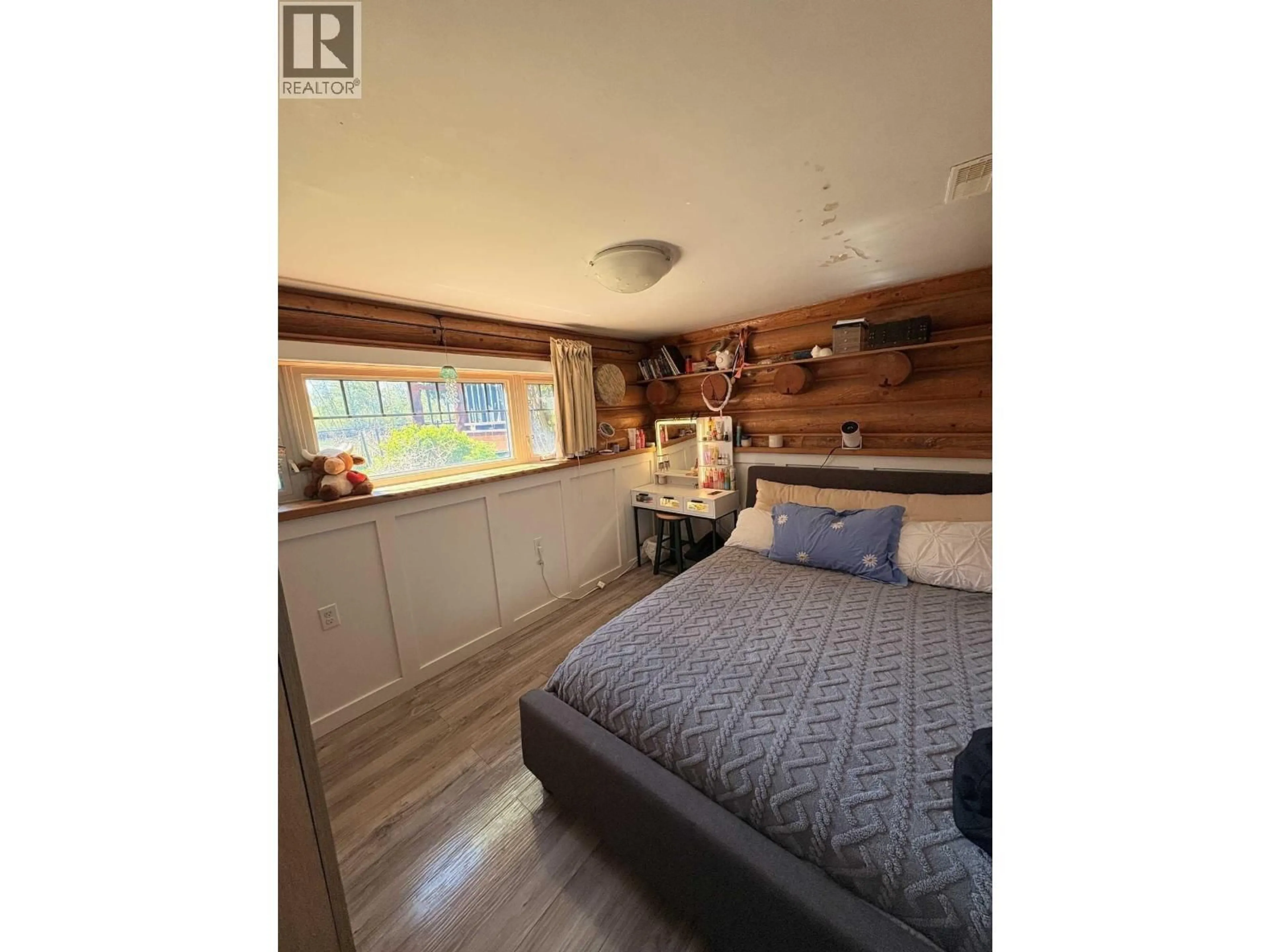 Bedroom with bed, wood/laminate floor for 330 REID DRIVE, Vanderhoof British Columbia V0J3A2