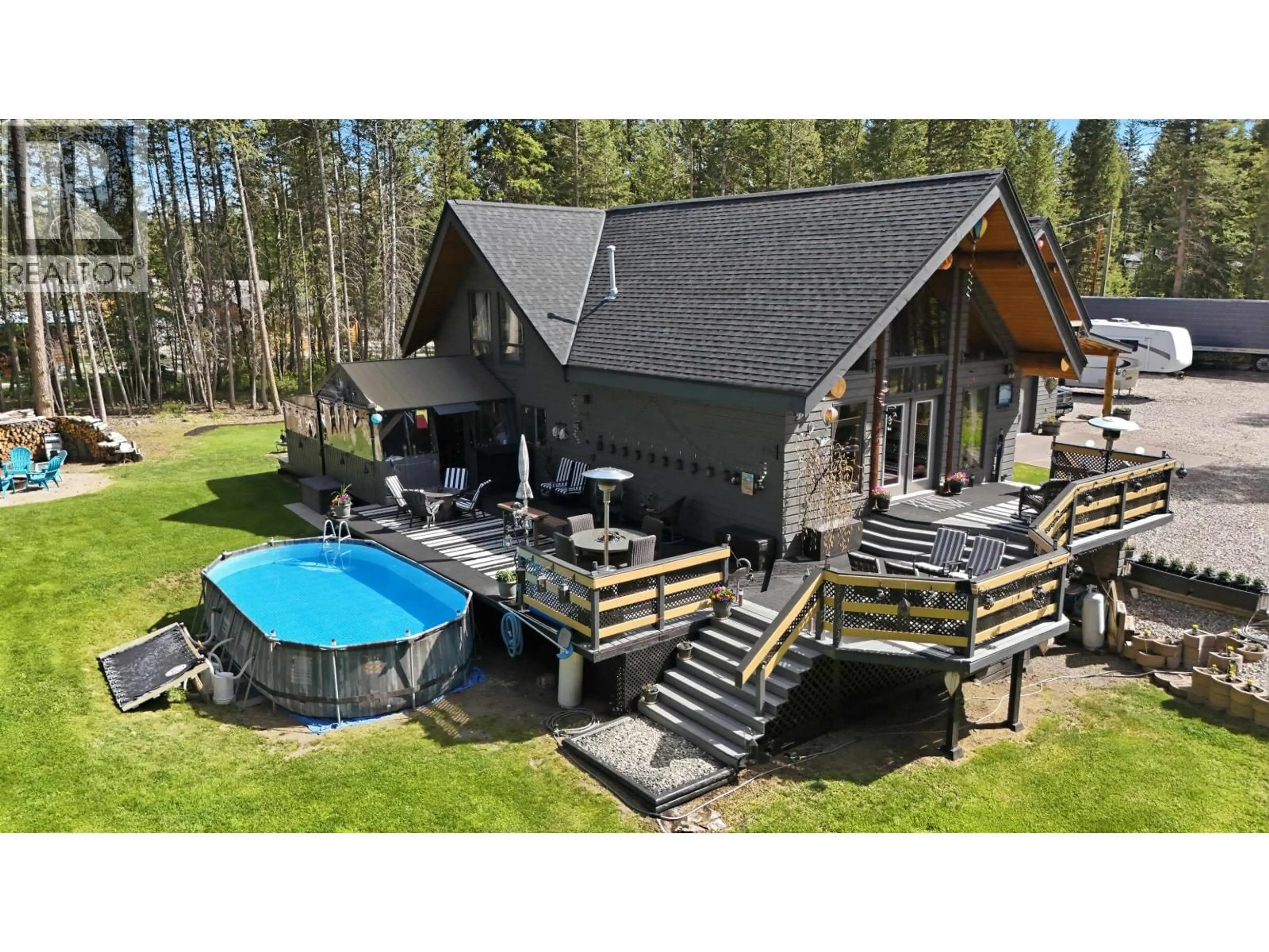 A pic from outside/outdoor area/front of a property/back of a property/a pic from drone, water/lake/river/ocean view for 3286 EAGLE WAY, Williams Lake British Columbia V0K2G0