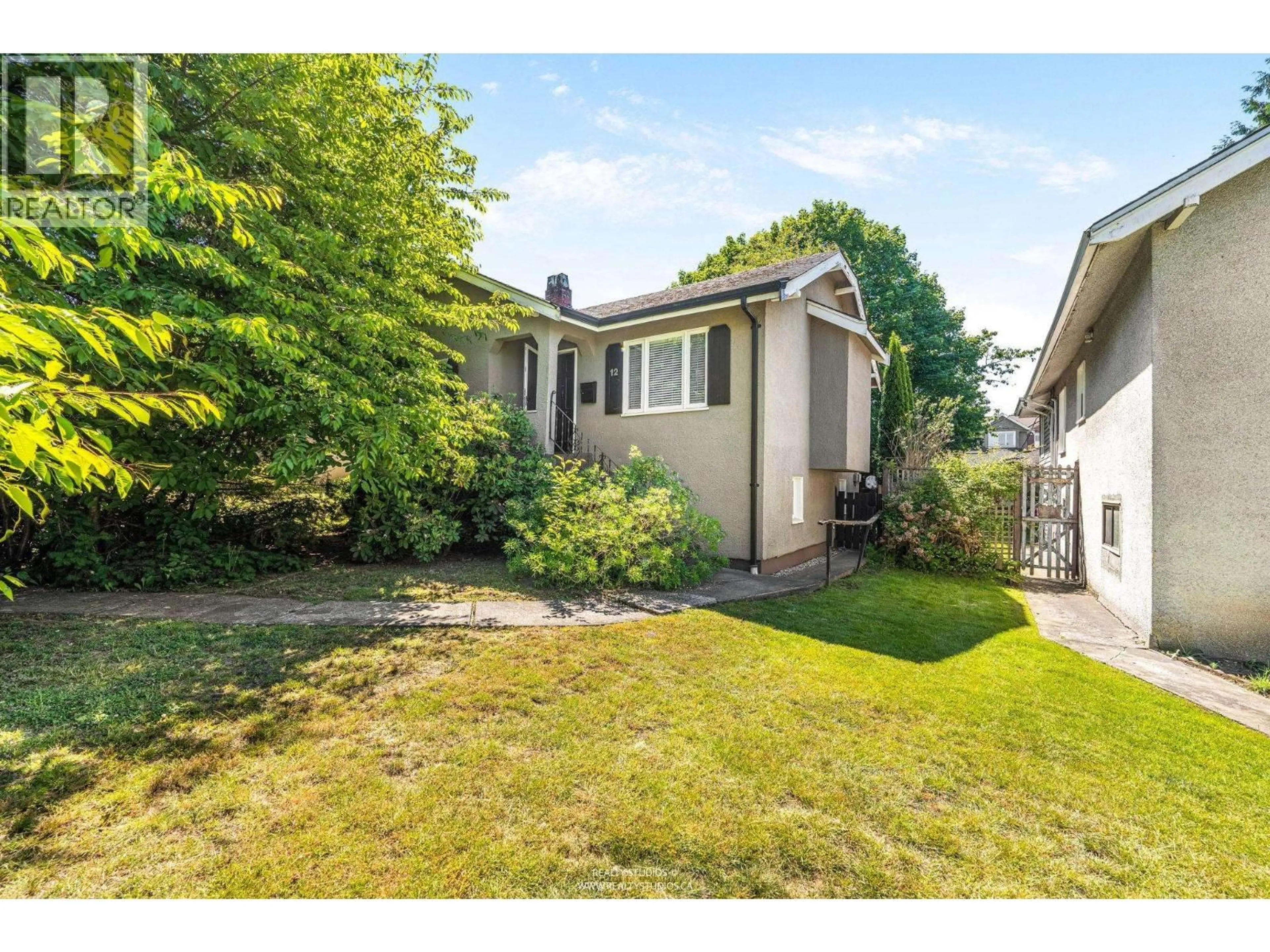 A pic from outside/outdoor area/front of a property/back of a property/a pic from drone, street for 12 KING EDWARD AVENUE, Vancouver British Columbia V5Y2H7