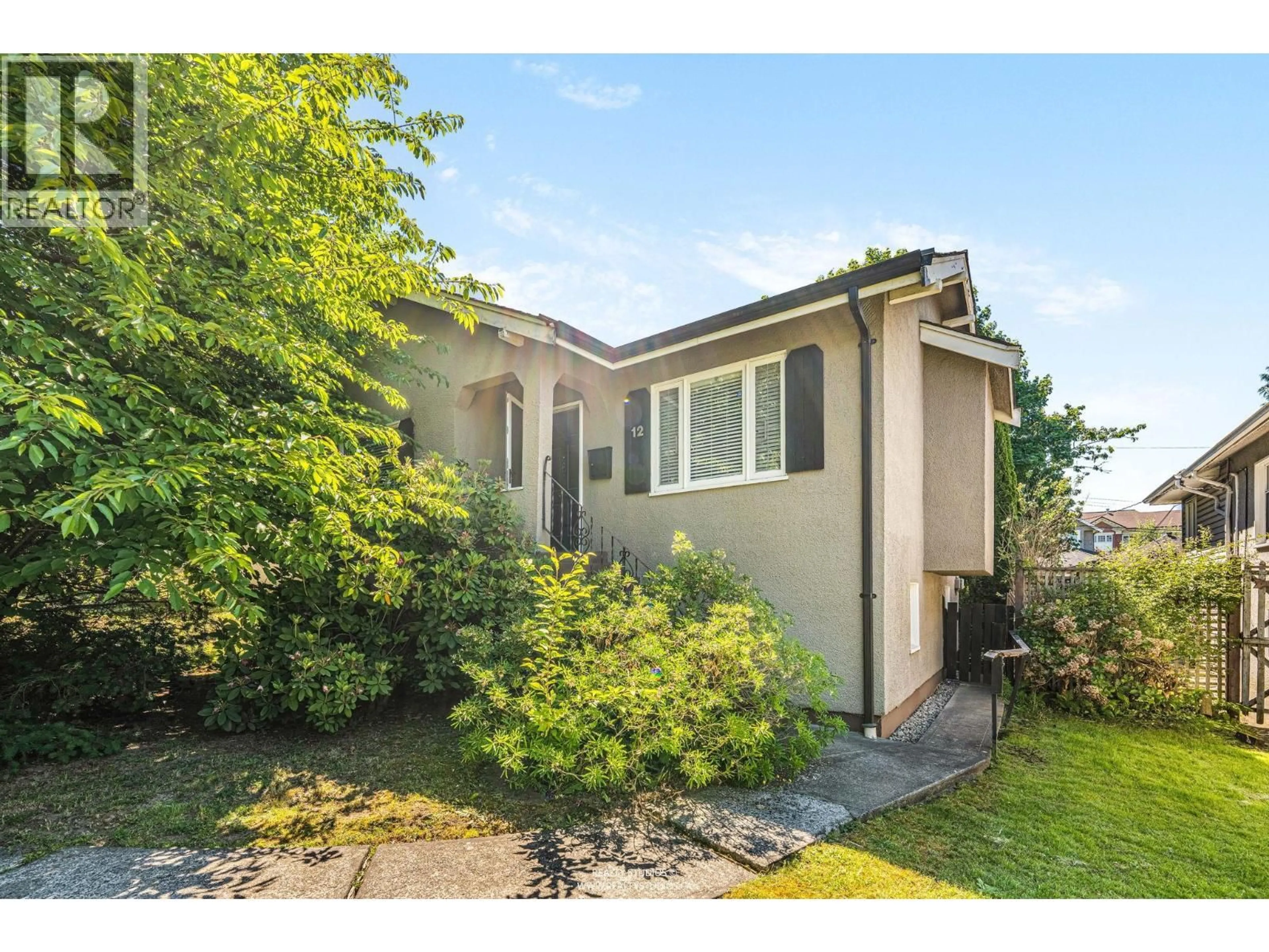 A pic from outside/outdoor area/front of a property/back of a property/a pic from drone, street for 12 KING EDWARD AVENUE, Vancouver British Columbia V5Y2H7
