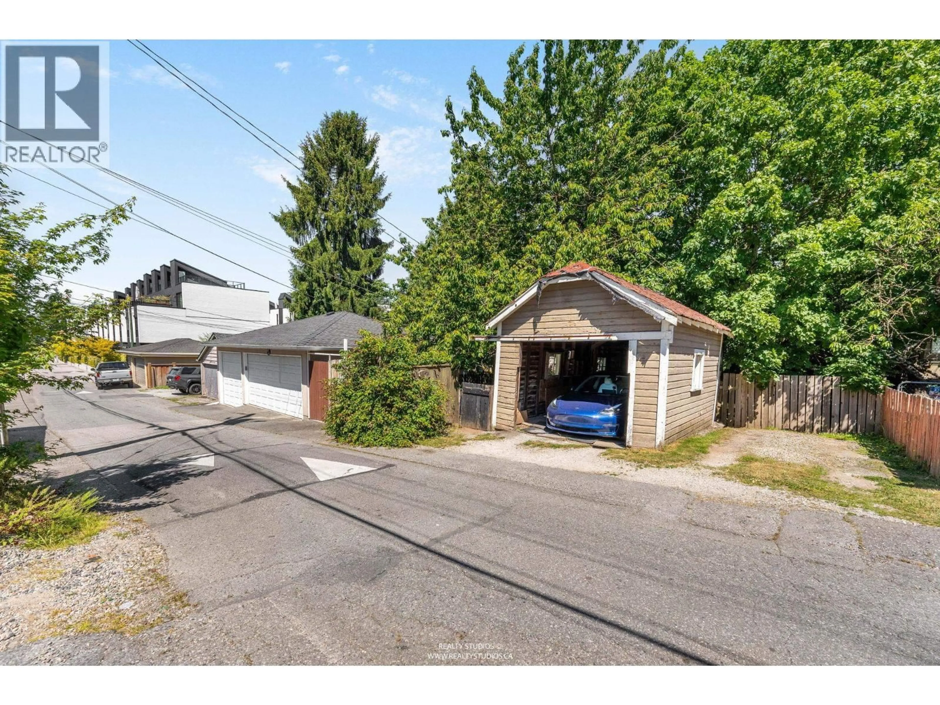 A pic from outside/outdoor area/front of a property/back of a property/a pic from drone, street for 12 KING EDWARD AVENUE, Vancouver British Columbia V5Y2H7