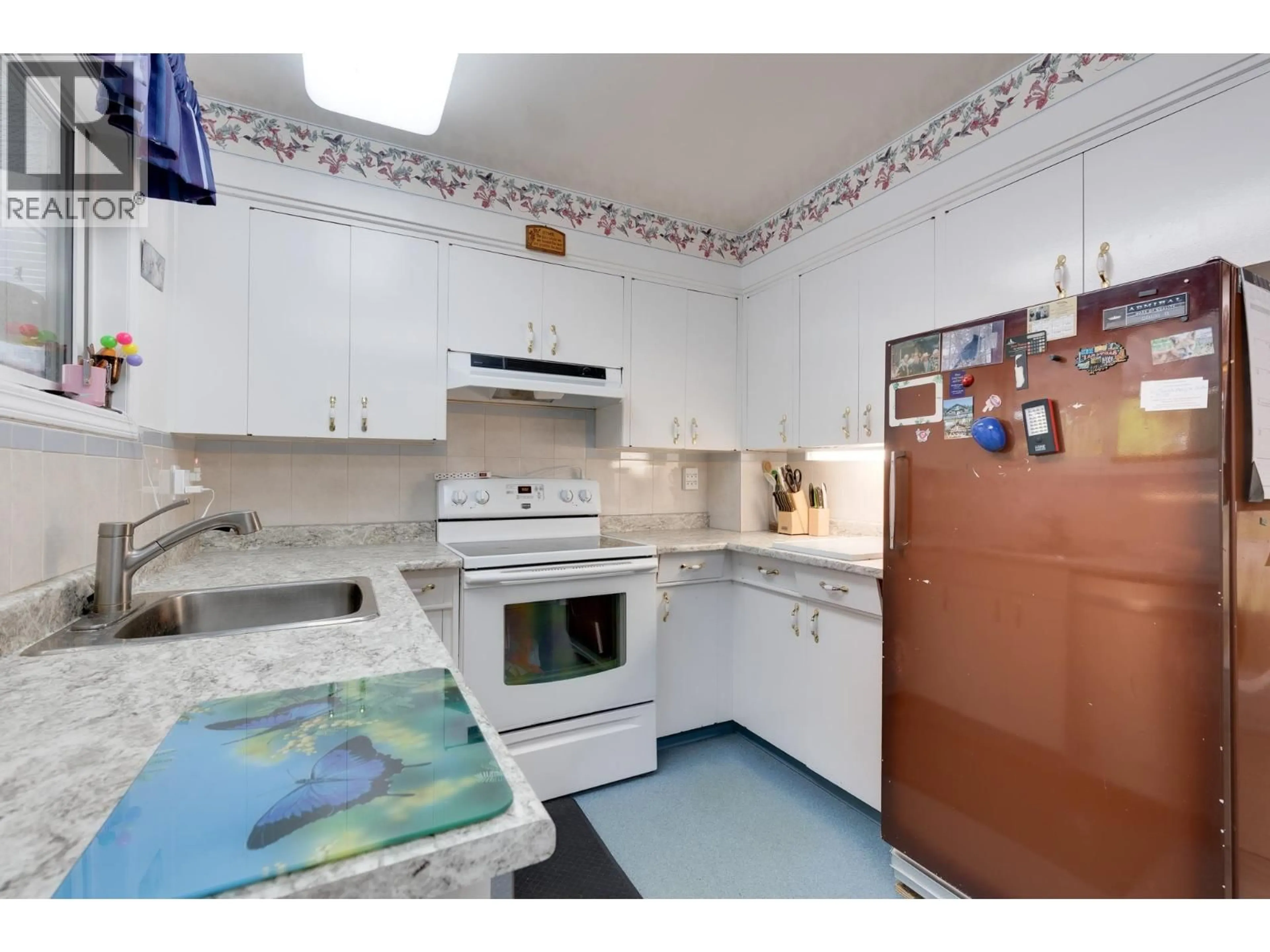 Standard kitchen, ceramic/tile floor for 132 MCKENZIE AVENUE, Prince George British Columbia V2L4N4