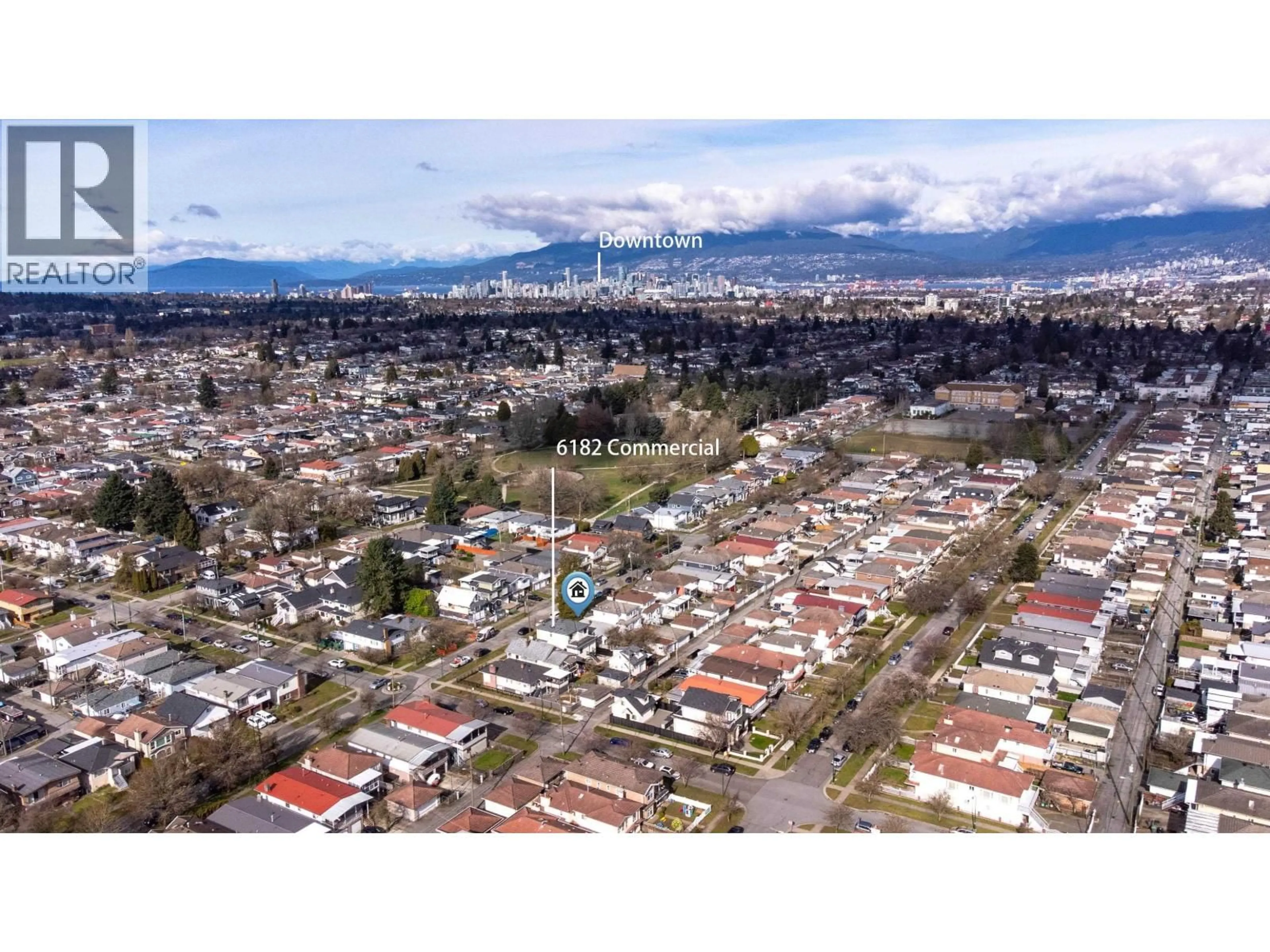 A pic from outside/outdoor area/front of a property/back of a property/a pic from drone, mountain view for 6182 COMMERCIAL STREET, Vancouver British Columbia V5P3N9