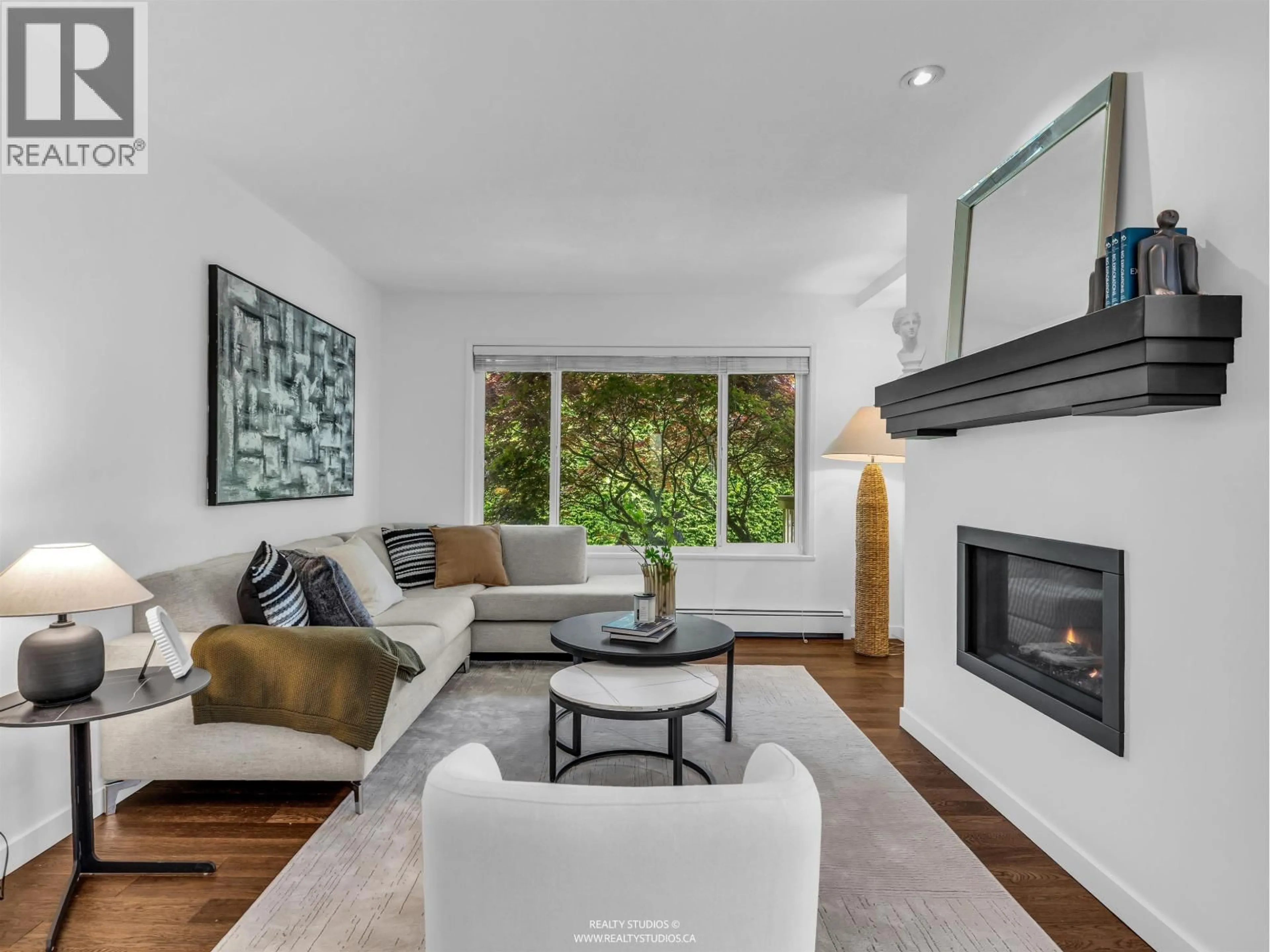 Living room with furniture, wood/laminate floor for 4531 BONAVISTA DRIVE, Richmond British Columbia V7E5B2