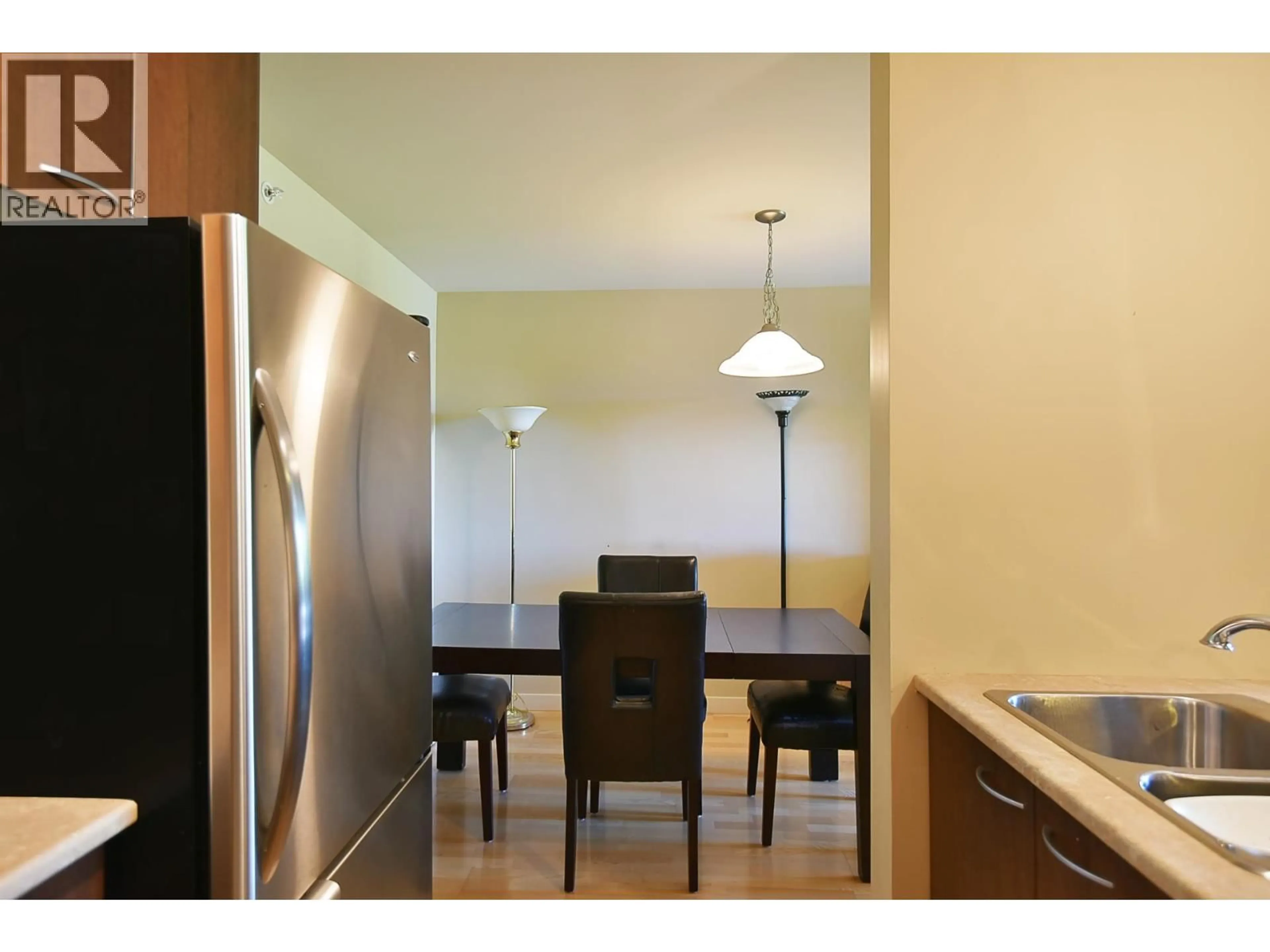 Dining room, wood/laminate floor for 403 - 5631 INLET AVENUE, Sechelt British Columbia V7Z0J1