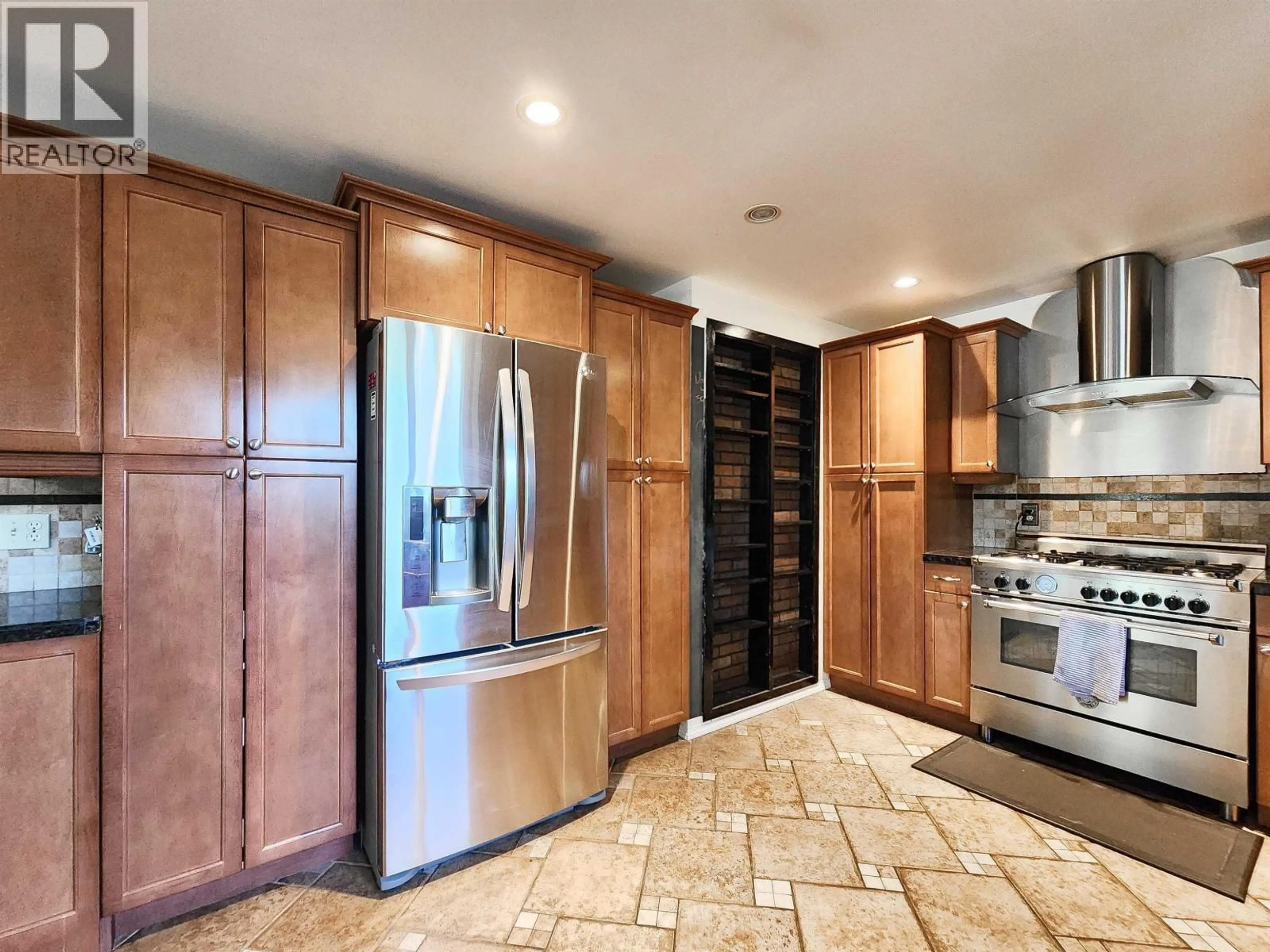 Contemporary kitchen, ceramic/tile floor for 2396 JASPER STREET, Prince George British Columbia V2L1P1
