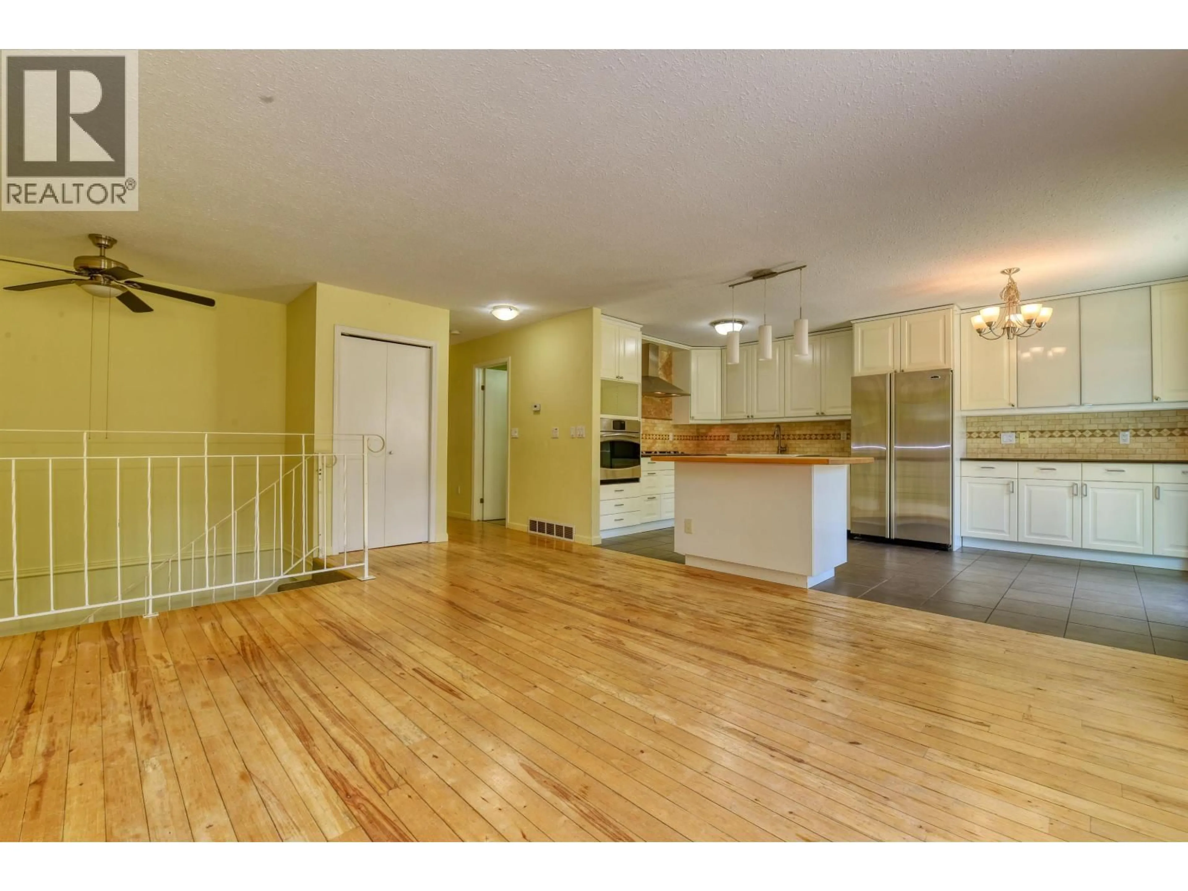 Open concept kitchen, wood/laminate floor for B - 390 FIRST AVENUE, Williams Lake British Columbia V2G1Z2