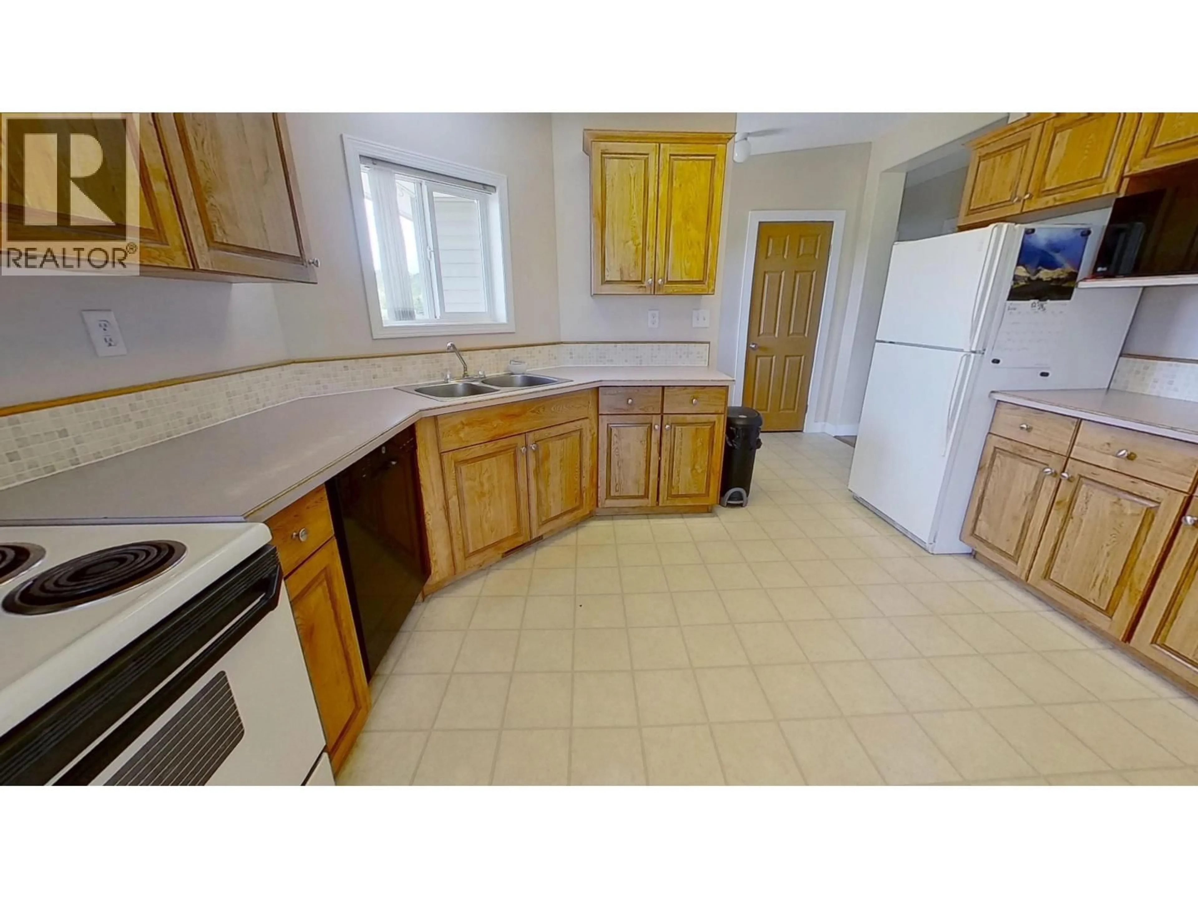 Standard kitchen, ceramic/tile floor for 15004 259 ROAD, Fort St. John British Columbia V0C2A0