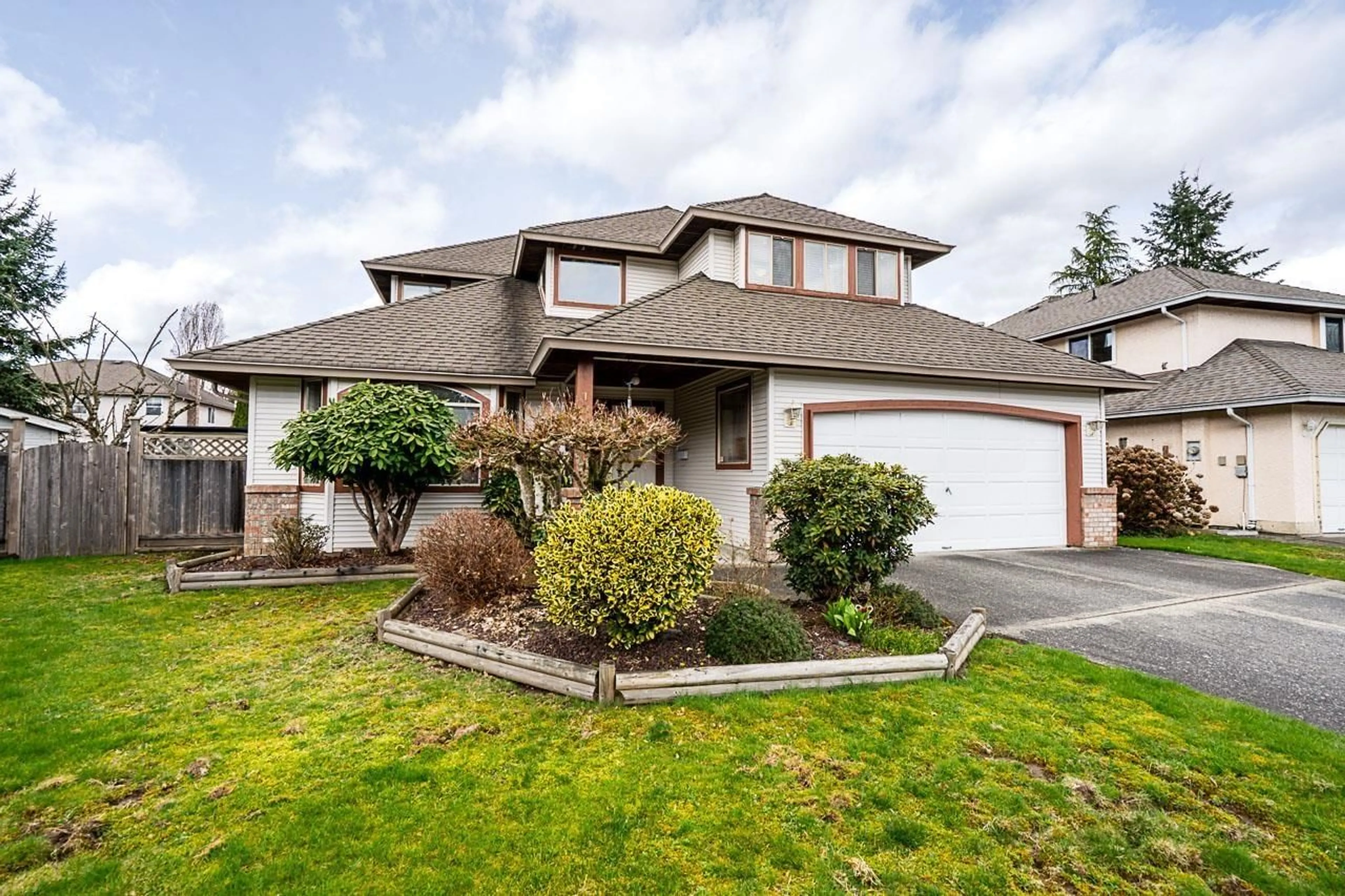 Home with vinyl exterior material, street for 16156 94A AVENUE, Surrey British Columbia V4N3A2