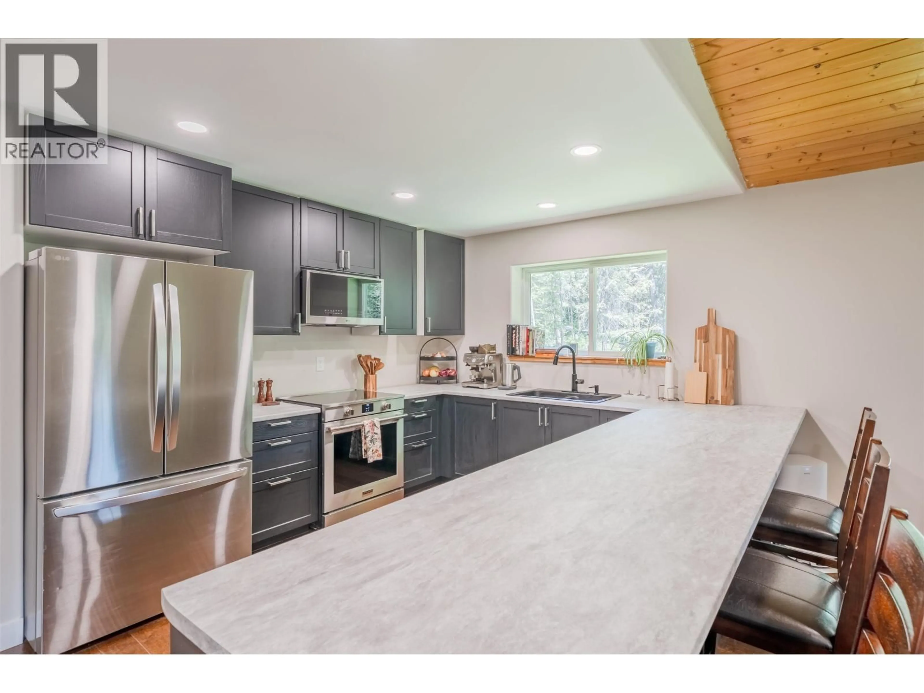 Open concept kitchen, unknown for 6341 REDPATH ROAD, Forest Grove British Columbia V0K1M0