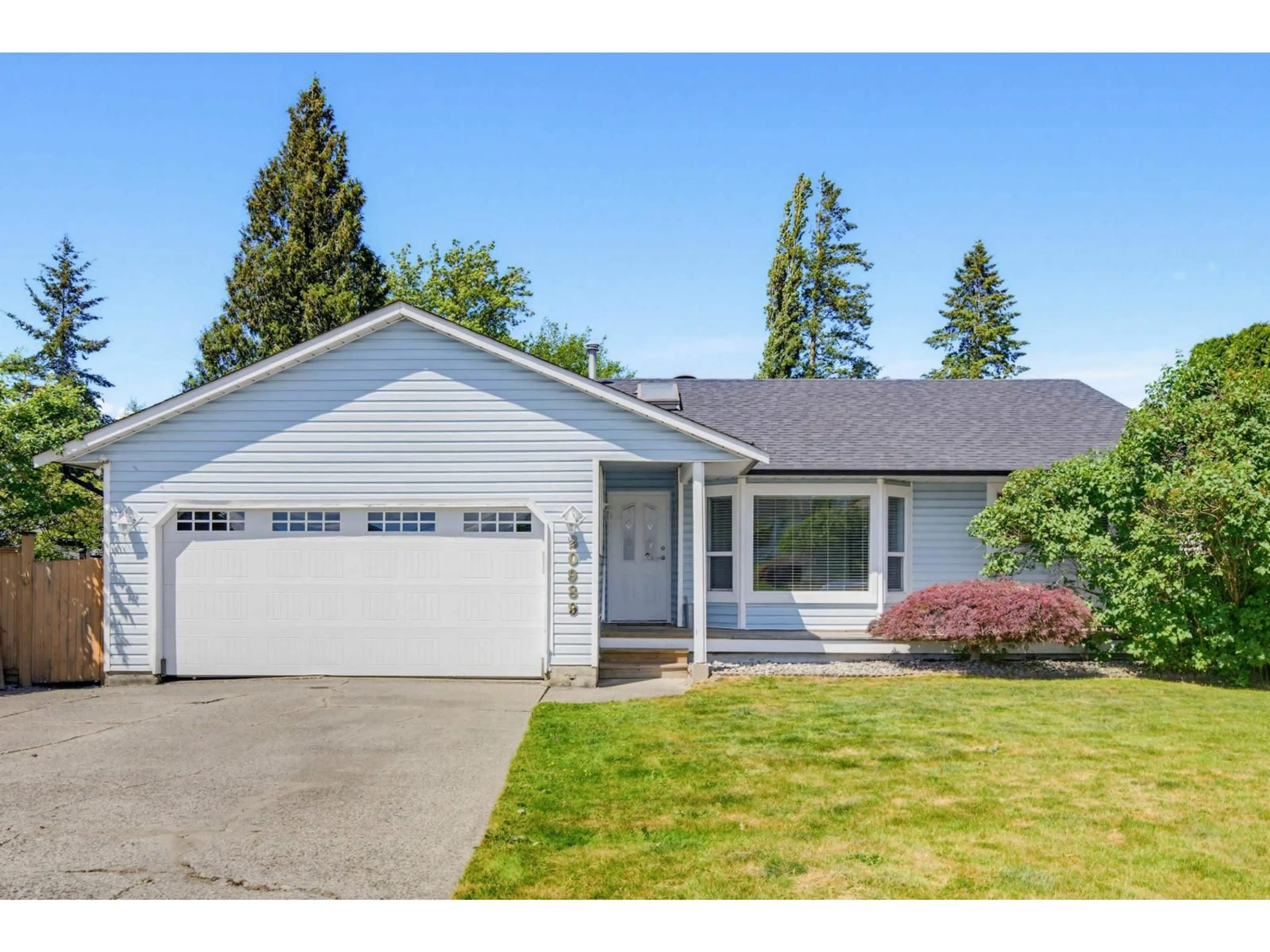 Home with vinyl exterior material, street for 20989 95A AVENUE, Langley British Columbia V1M2A6