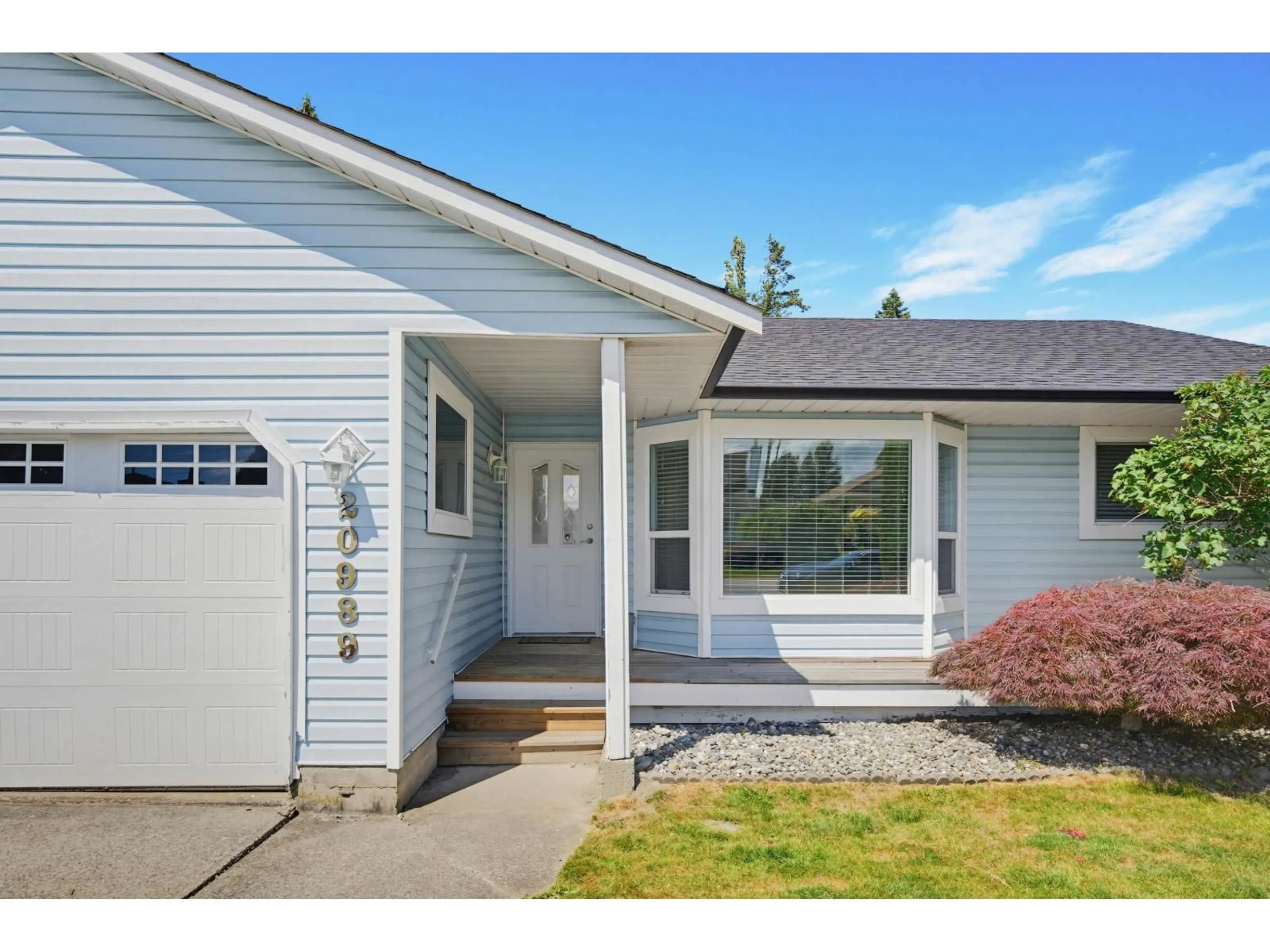 Home with vinyl exterior material, street for 20989 95A AVENUE, Langley British Columbia V1M2A6