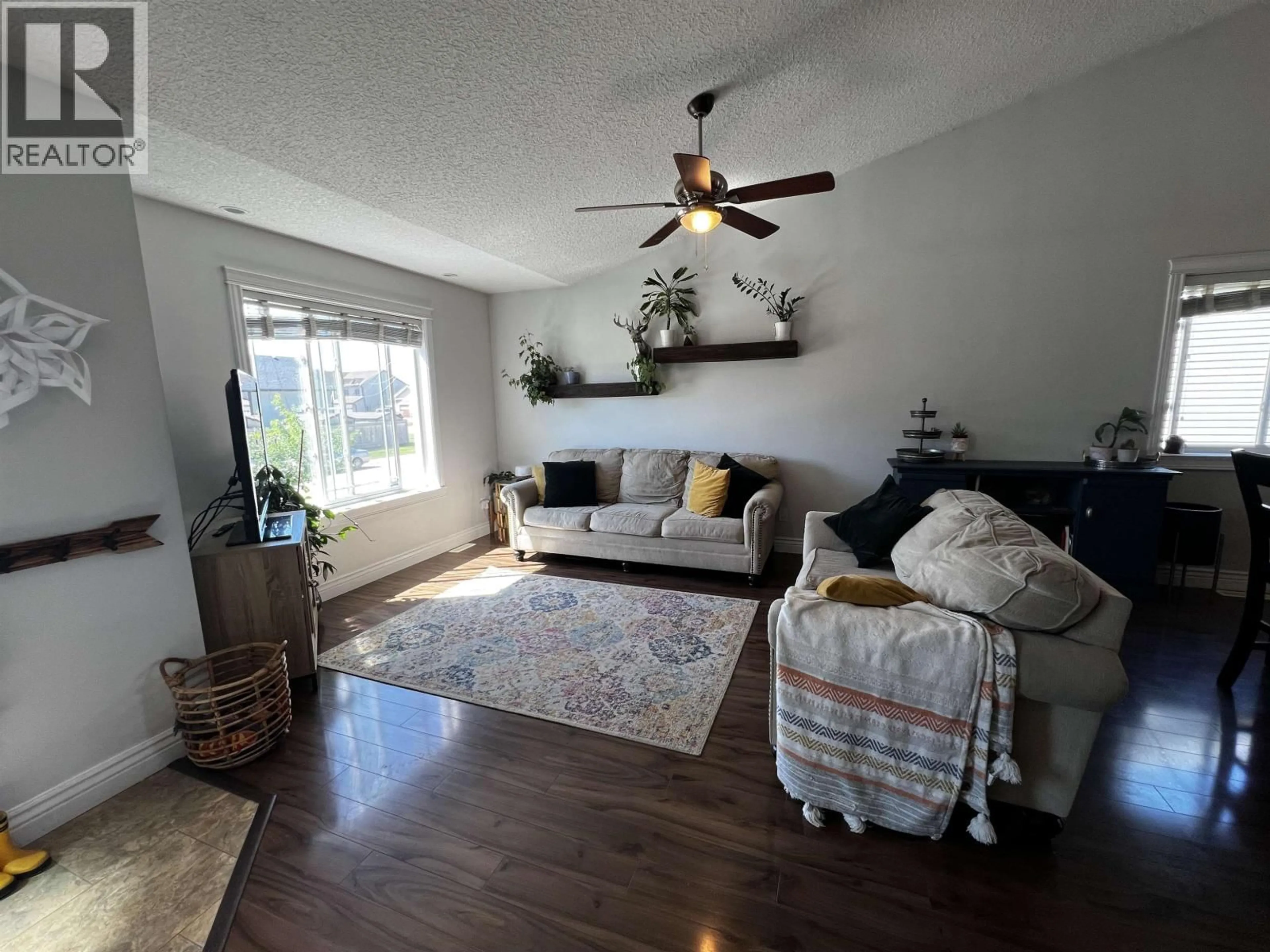 Living room with furniture, unknown for 9712 118 AVENUE, Fort St. John British Columbia V1J0E9