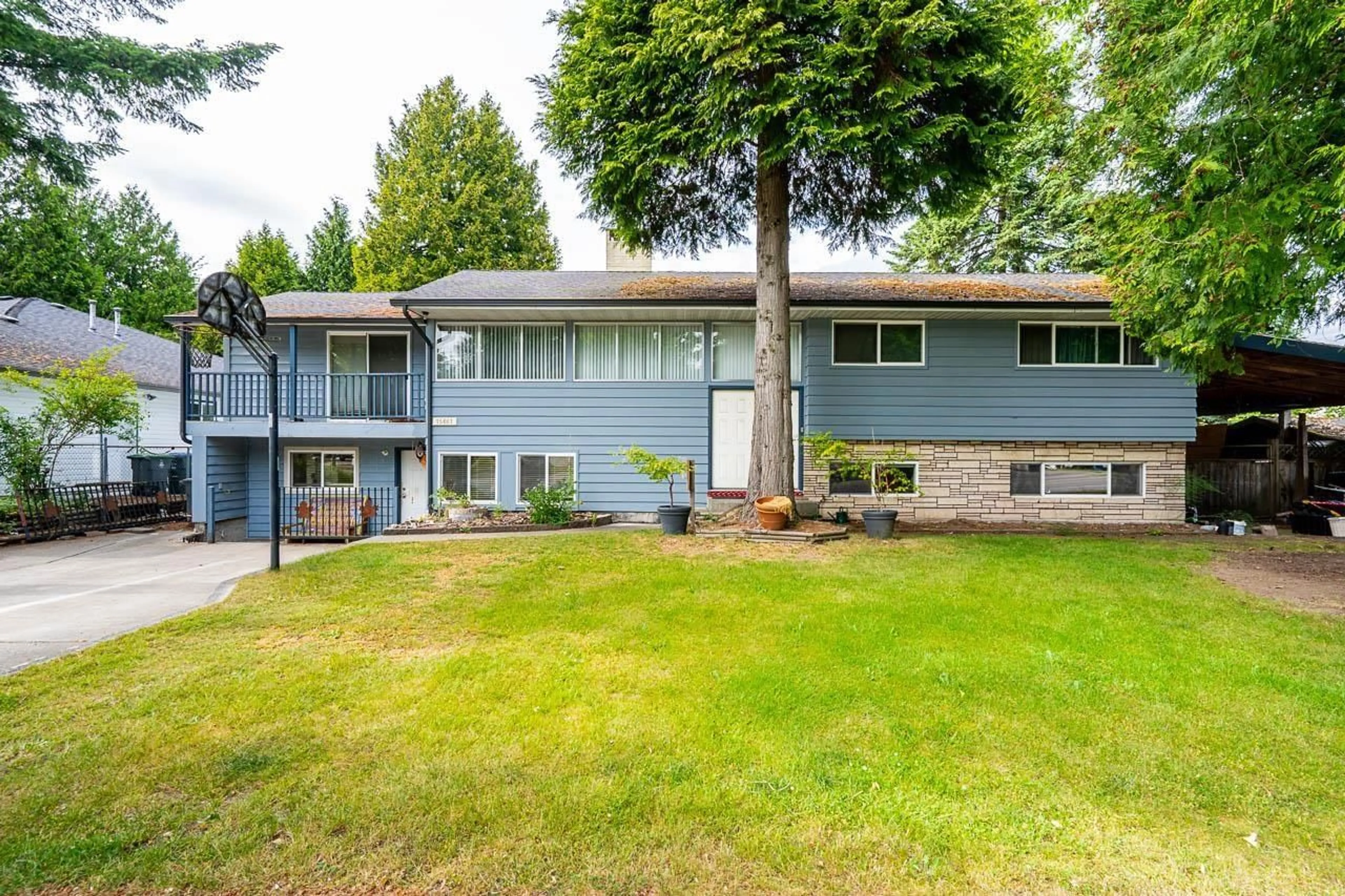 Home with vinyl exterior material, street for 15661 92 AVENUE, Surrey British Columbia V4N3C3