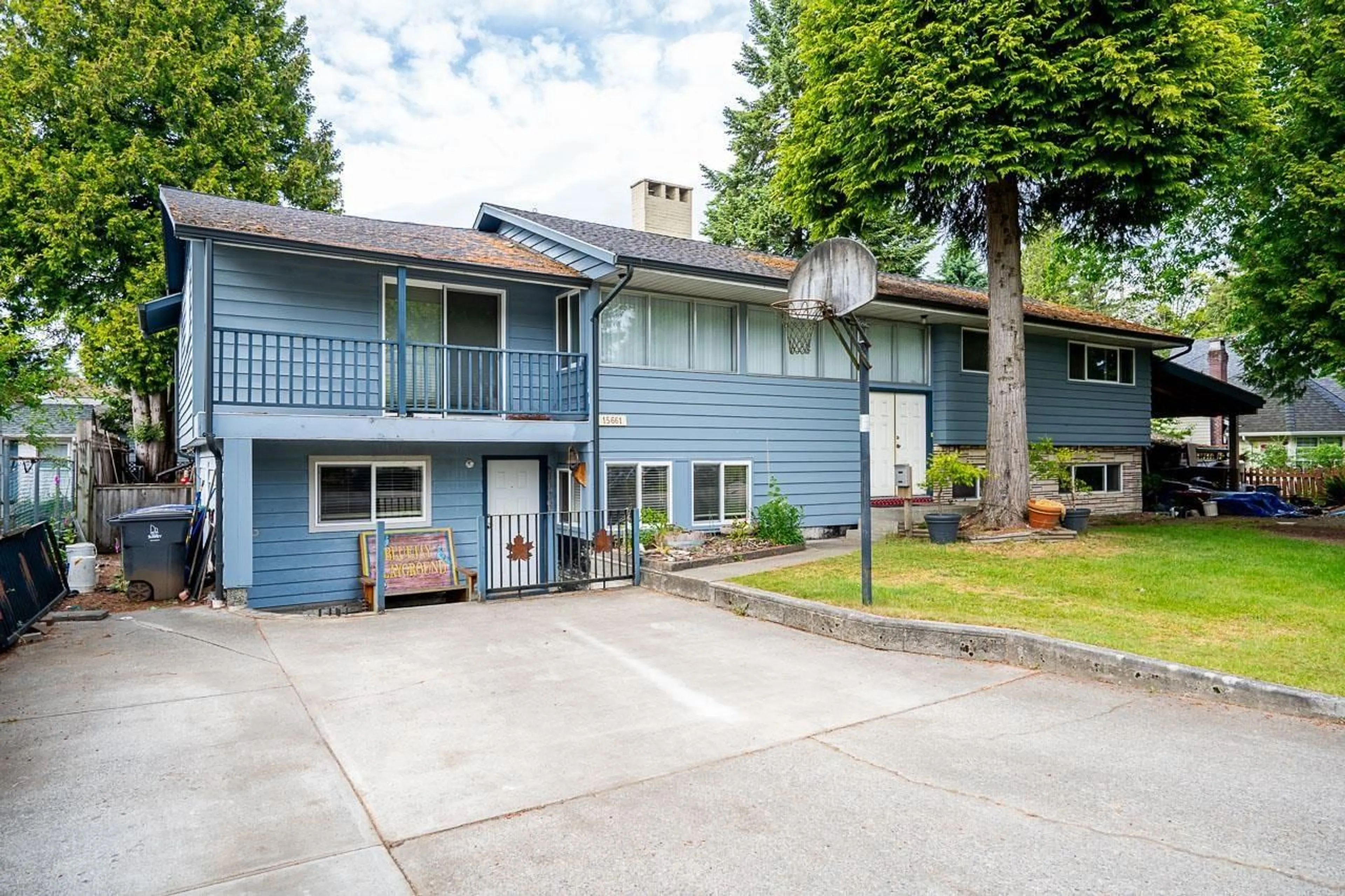 Home with vinyl exterior material, street for 15661 92 AVENUE, Surrey British Columbia V4N3C3