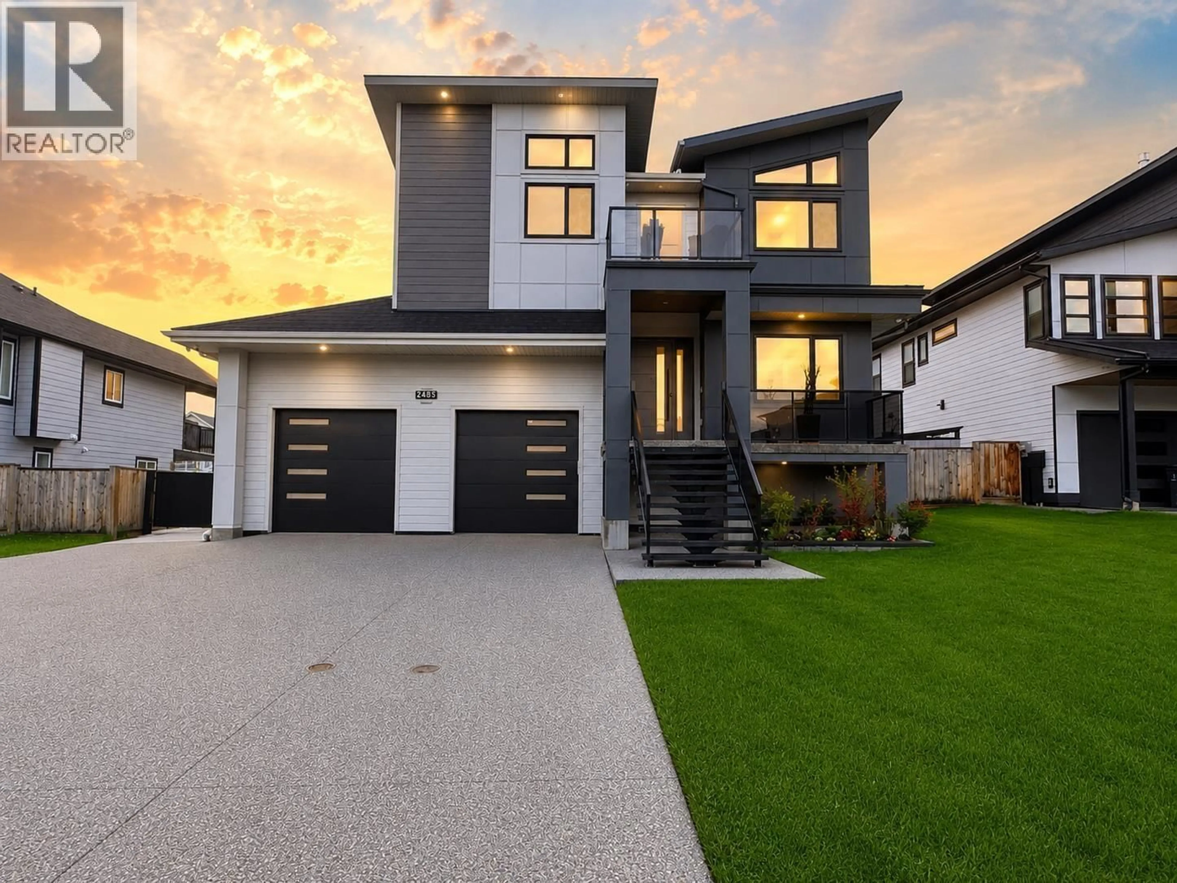 Home with vinyl exterior material, street for 2485 ROWE STREET, Prince George British Columbia V2N0B9