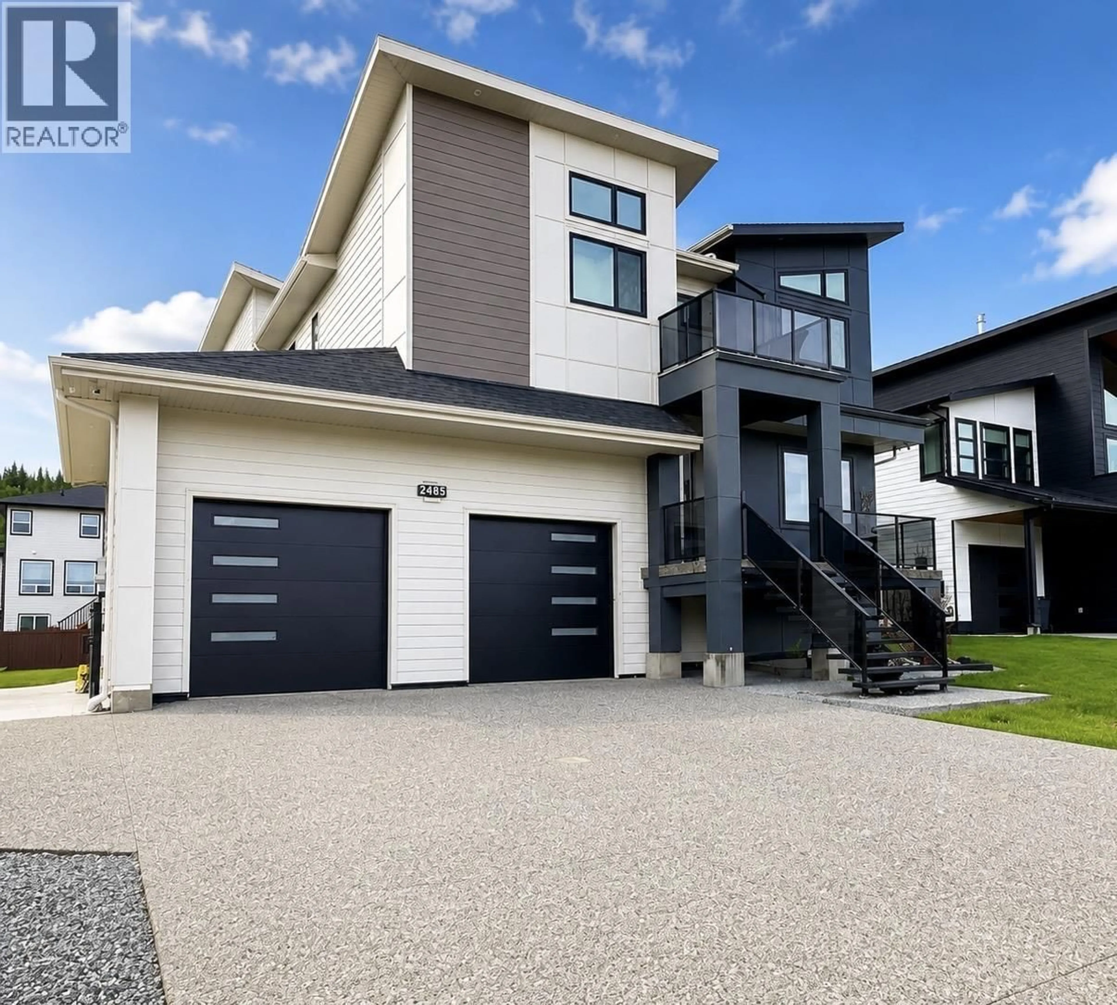 Home with vinyl exterior material, street for 2485 ROWE STREET, Prince George British Columbia V2N0B9
