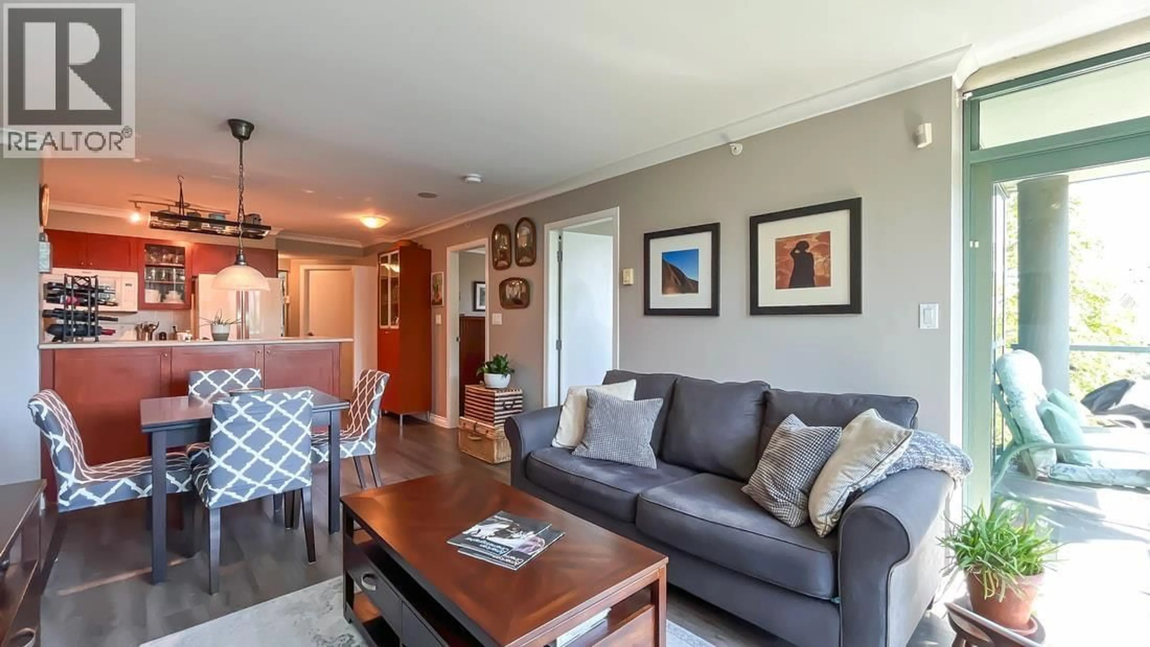 Living room with furniture, wood/laminate floor for 206 - 2733 CHANDLERY PLACE, Vancouver British Columbia V5S4V3