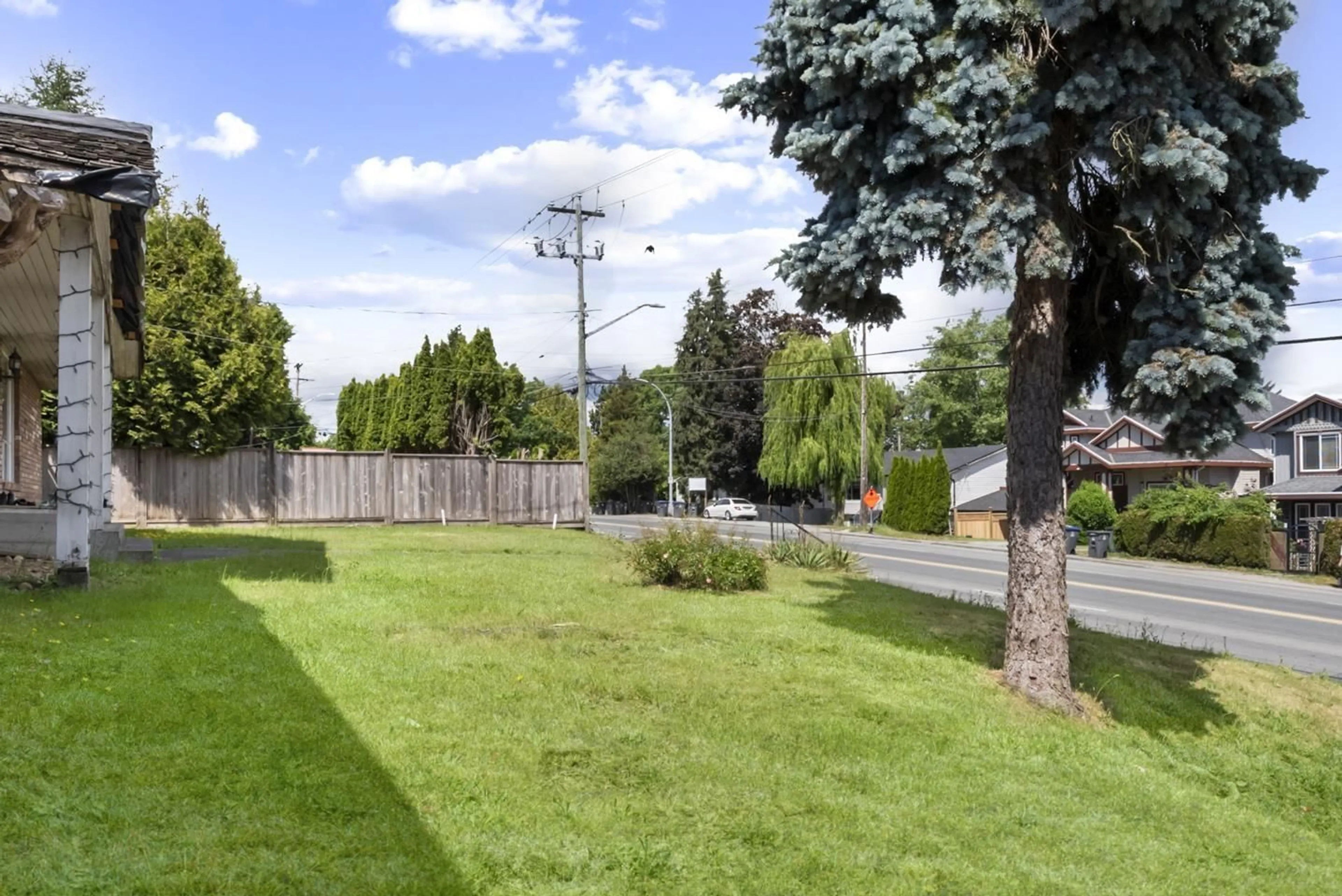 A pic from outside/outdoor area/front of a property/back of a property/a pic from drone, street for 12140 96 AVENUE, Surrey British Columbia V3V1W4