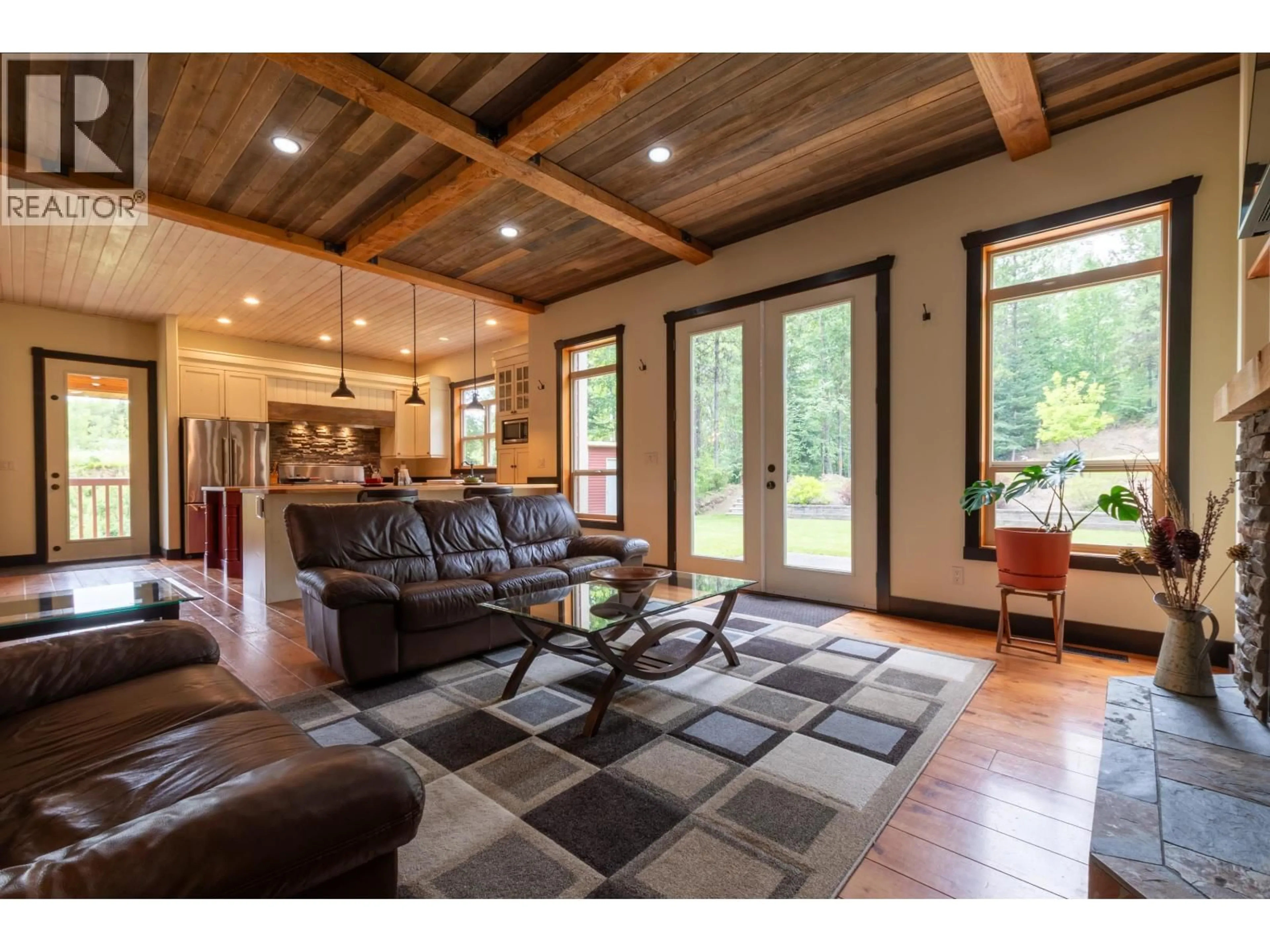 Living room with furniture, wood/laminate floor for 1805 SHARELENE DRIVE, Prince George British Columbia V2M7B6