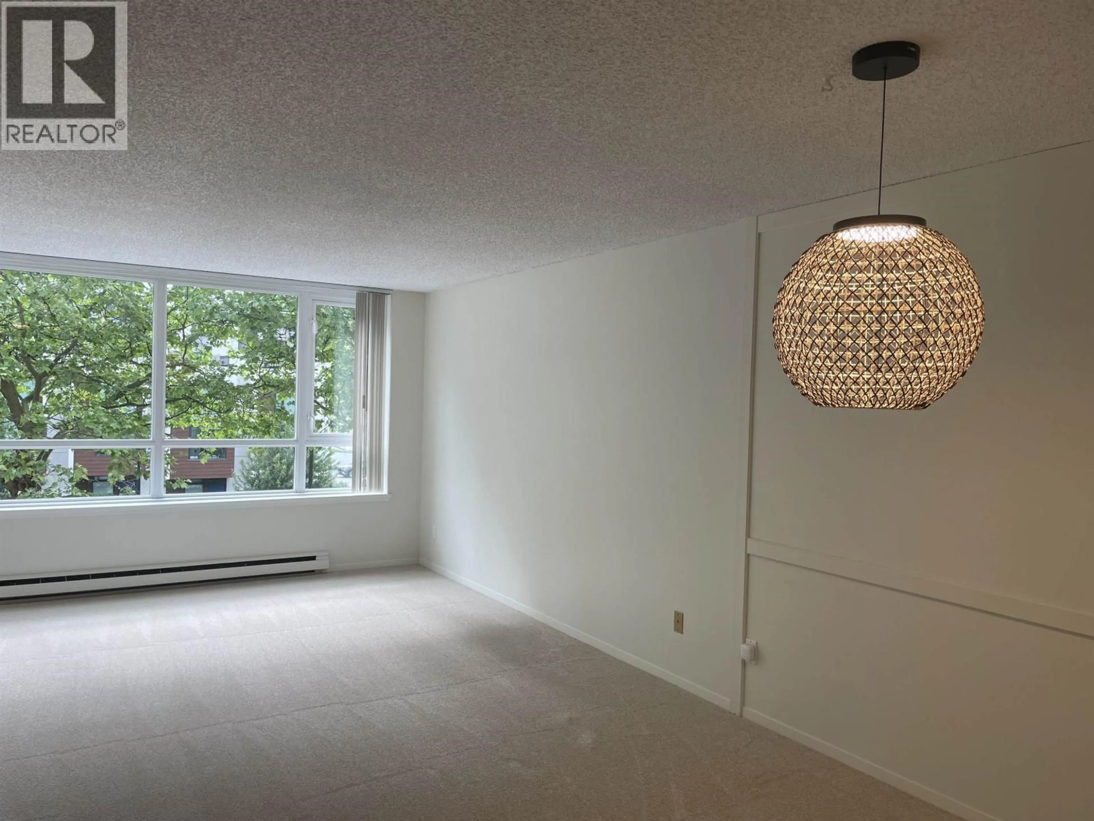 A pic of a room for 305 - 6070 MCMURRAY AVENUE, Burnaby British Columbia V5H4J3