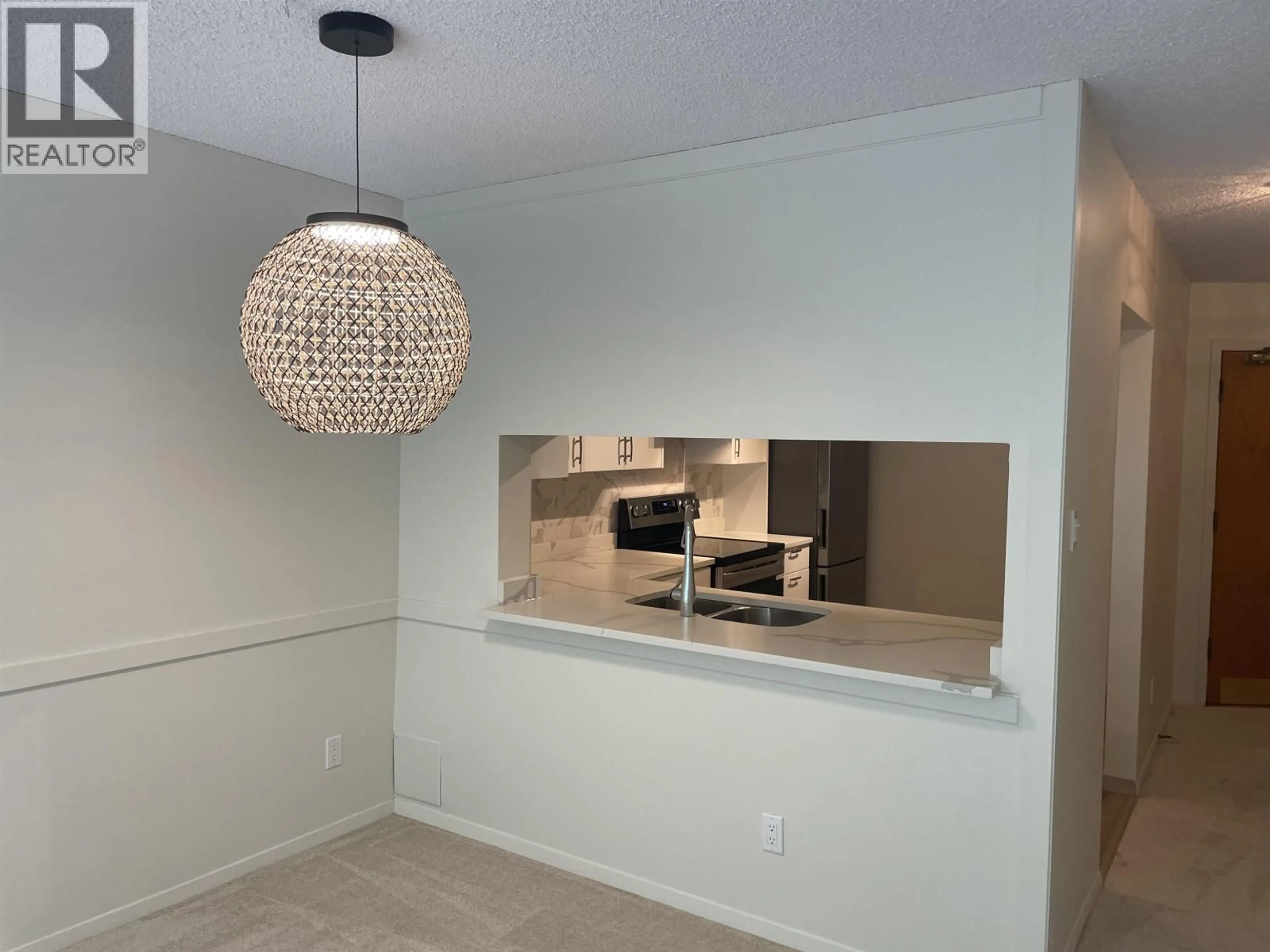 Open concept kitchen, unknown for 305 - 6070 MCMURRAY AVENUE, Burnaby British Columbia V5H4J3