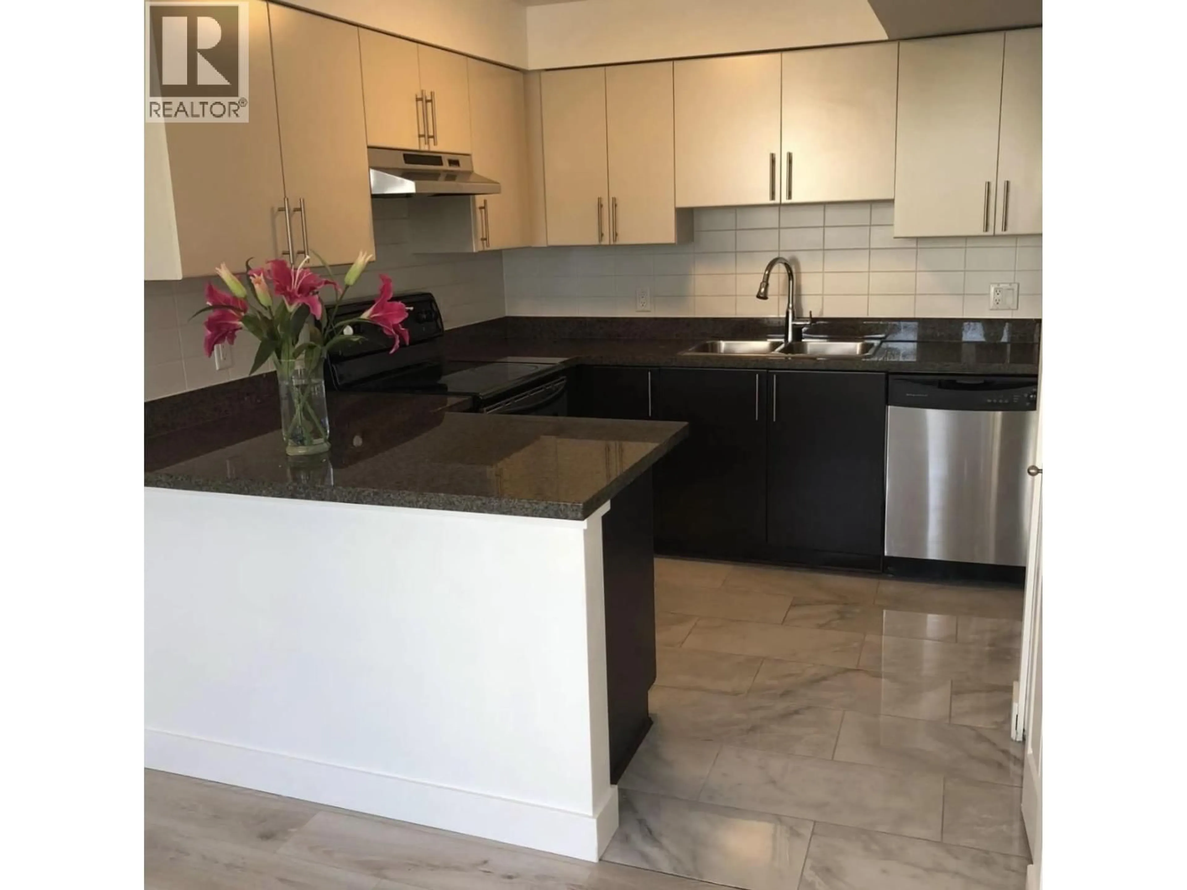 Open concept kitchen, ceramic/tile floor for 206 - 5649 KINGS ROAD, Vancouver British Columbia V6T1K9