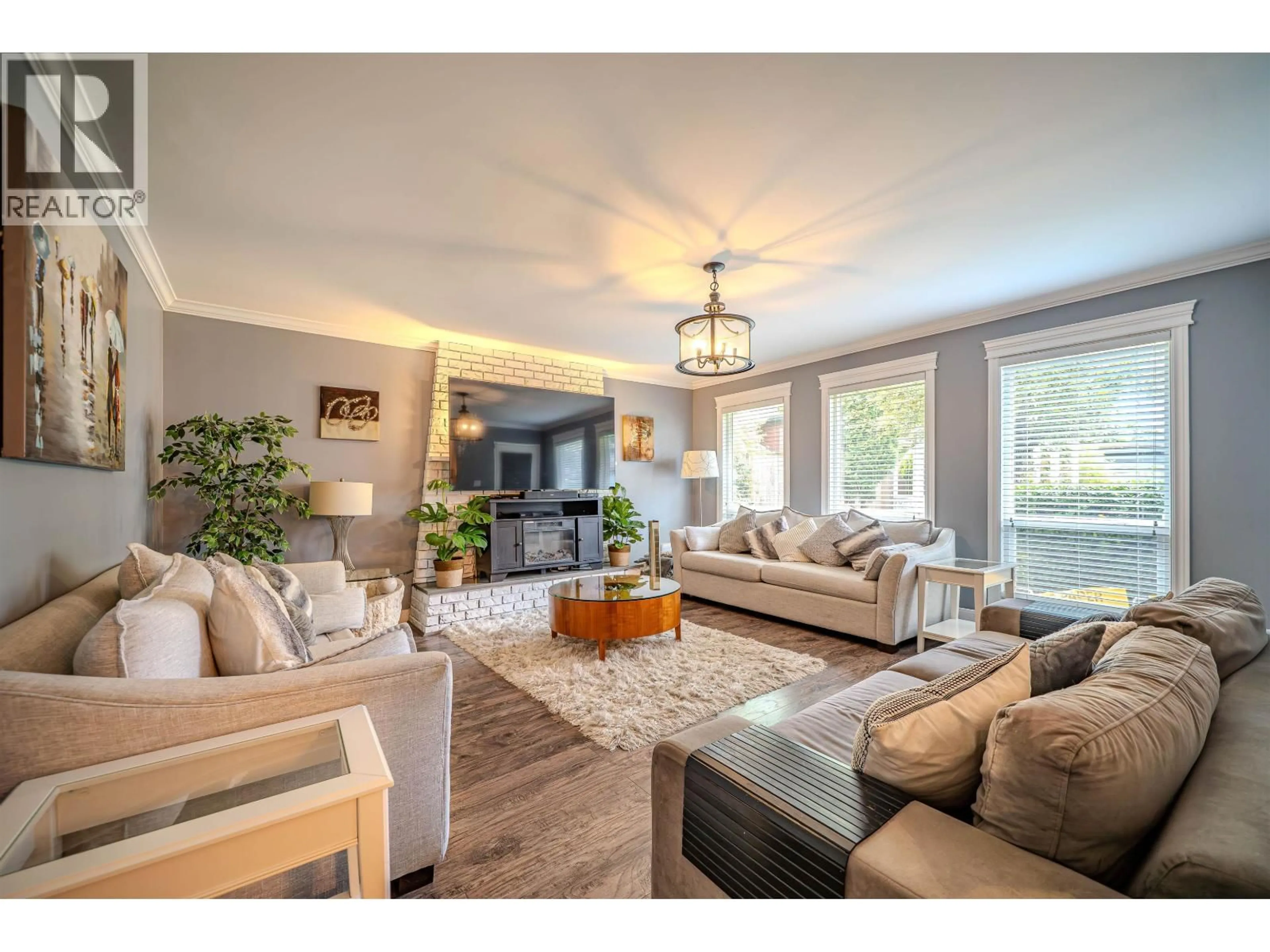 Living room with furniture, wood/laminate floor for 11860 DEWSBURY DRIVE, Richmond British Columbia V6X2Y7