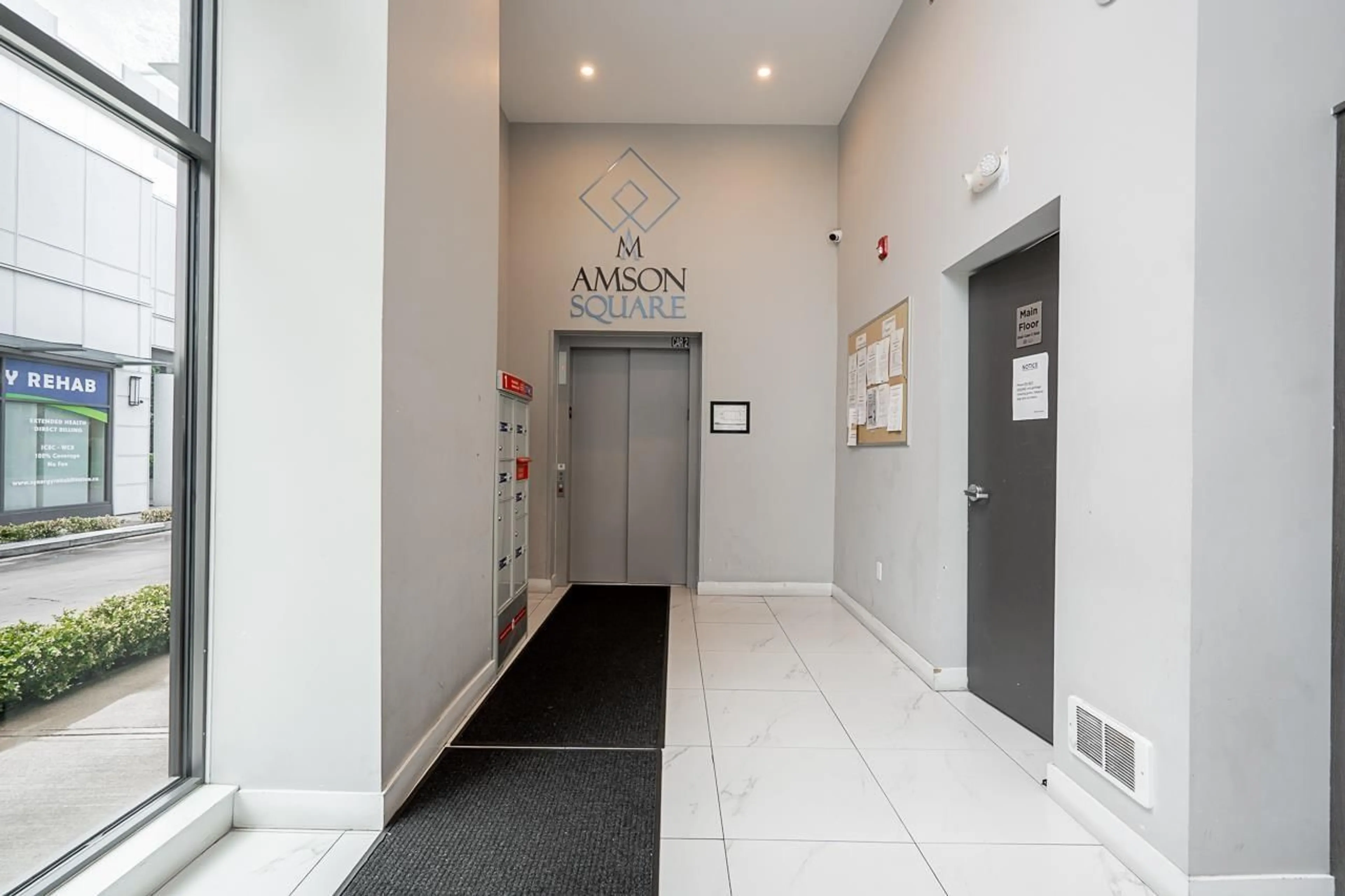 Indoor foyer for B203 - 14438 72 AVENUE, Surrey British Columbia V3S2E7
