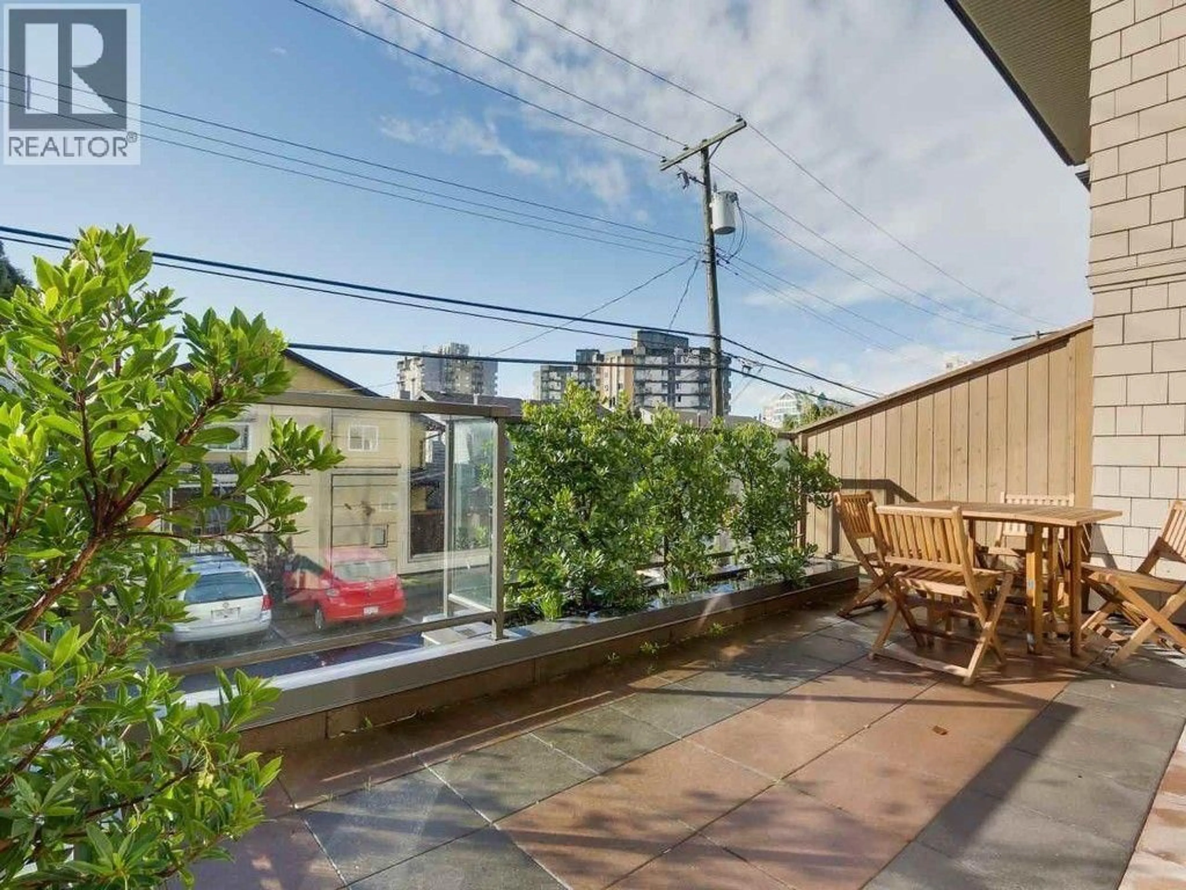 Patio, city buildings view from balcony for 7 - 215 4 STREET, North Vancouver British Columbia V7L1J1
