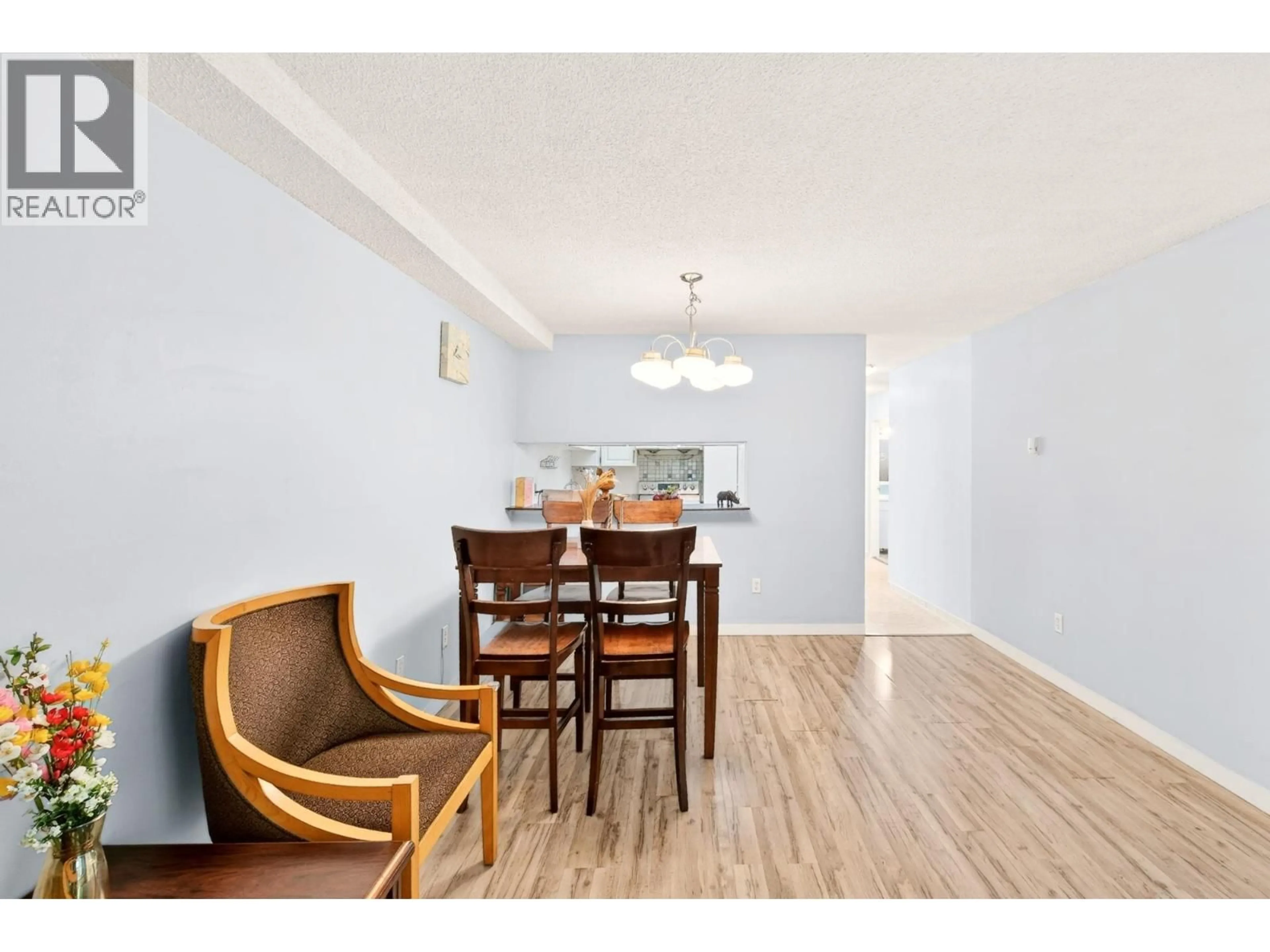 Dining room, wood/laminate floor for 102 - 8460 ACKROYD ROAD, Richmond British Columbia V6X3E9