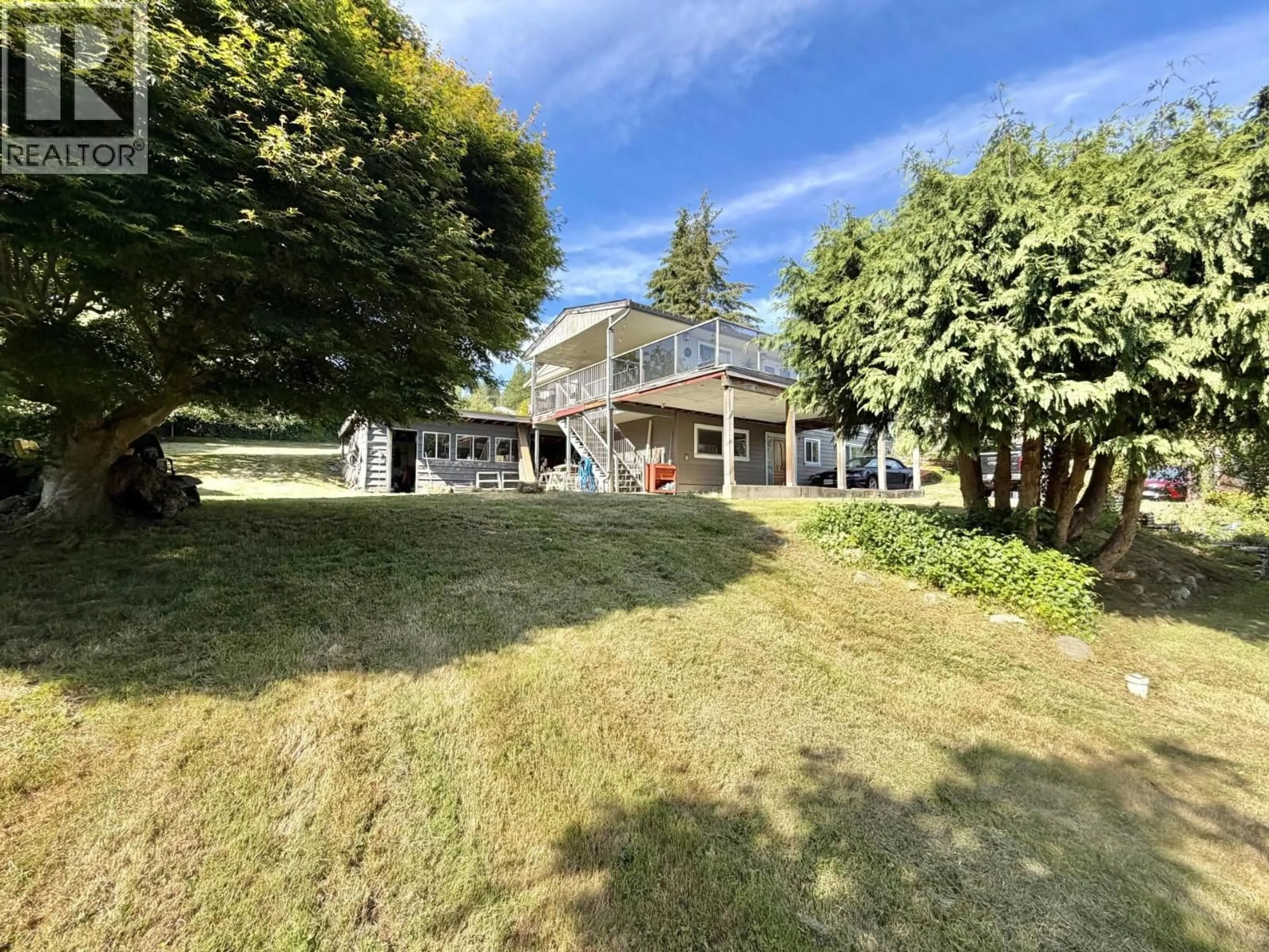 A pic from outside/outdoor area/front of a property/back of a property/a pic from drone, water/lake/river/ocean view for 5439 MASON ROAD, Sechelt British Columbia V0N3A8
