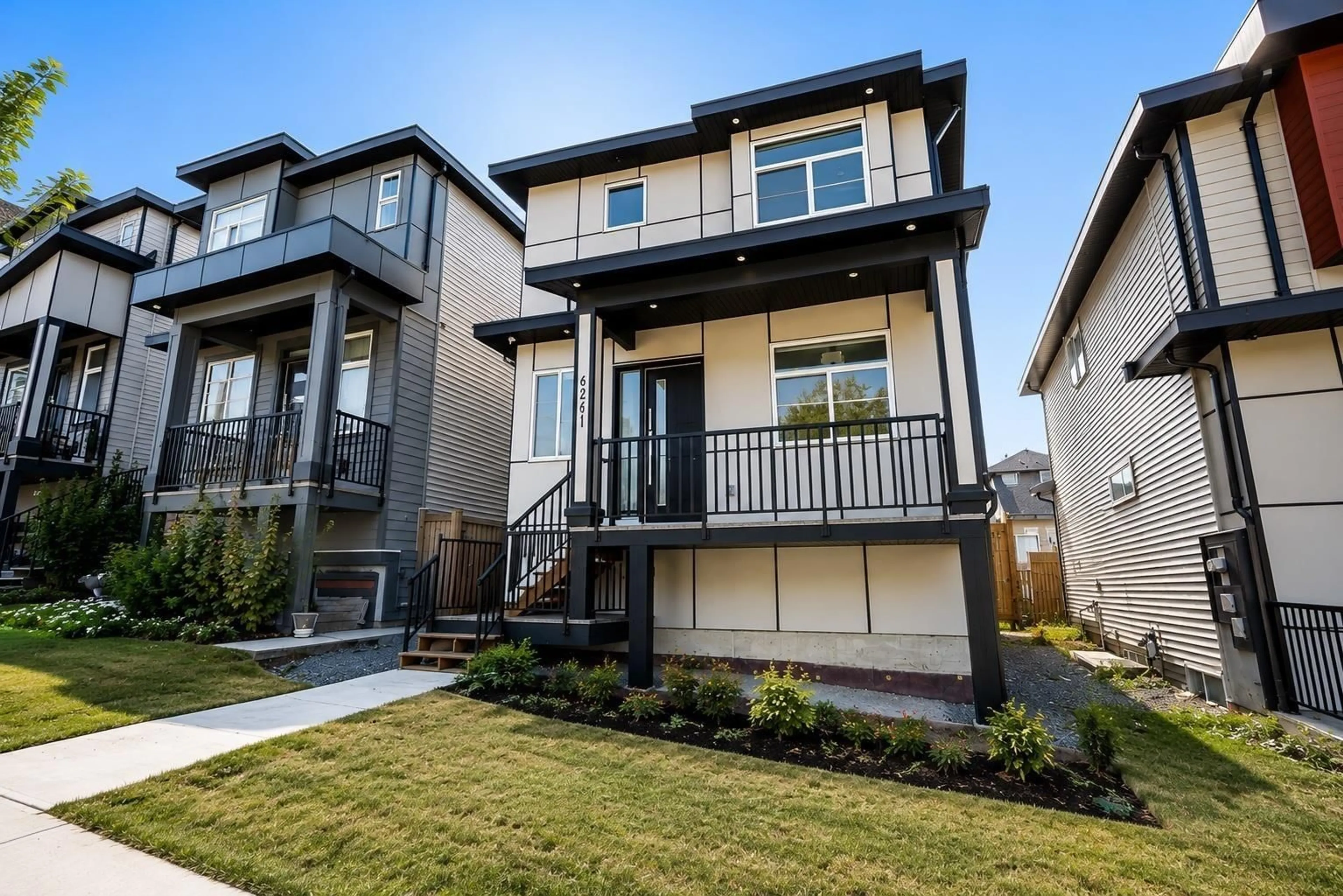 Home with vinyl exterior material, street for 6261 148 STREET, Surrey British Columbia V3S3T1