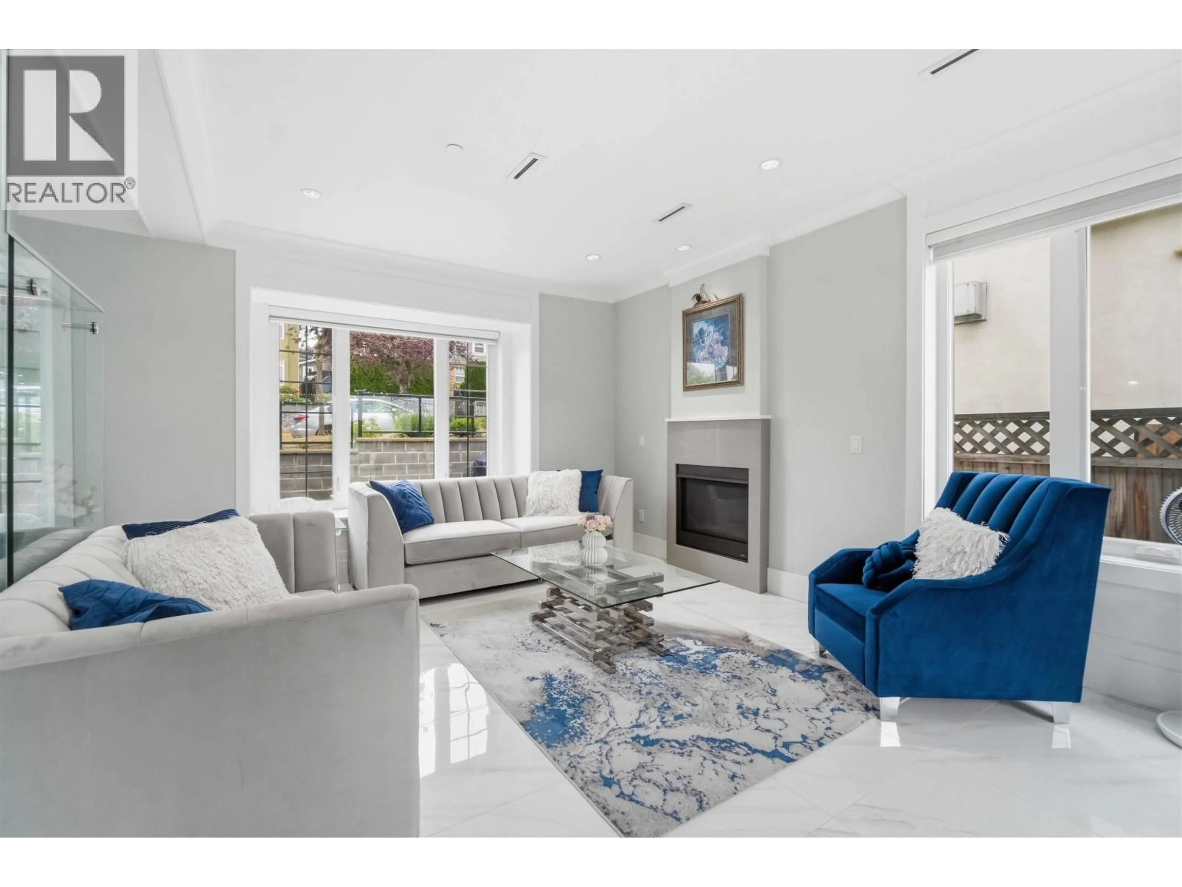 Living room with furniture, ceramic/tile floor for 1842 64TH AVENUE, Vancouver British Columbia V5P2N1