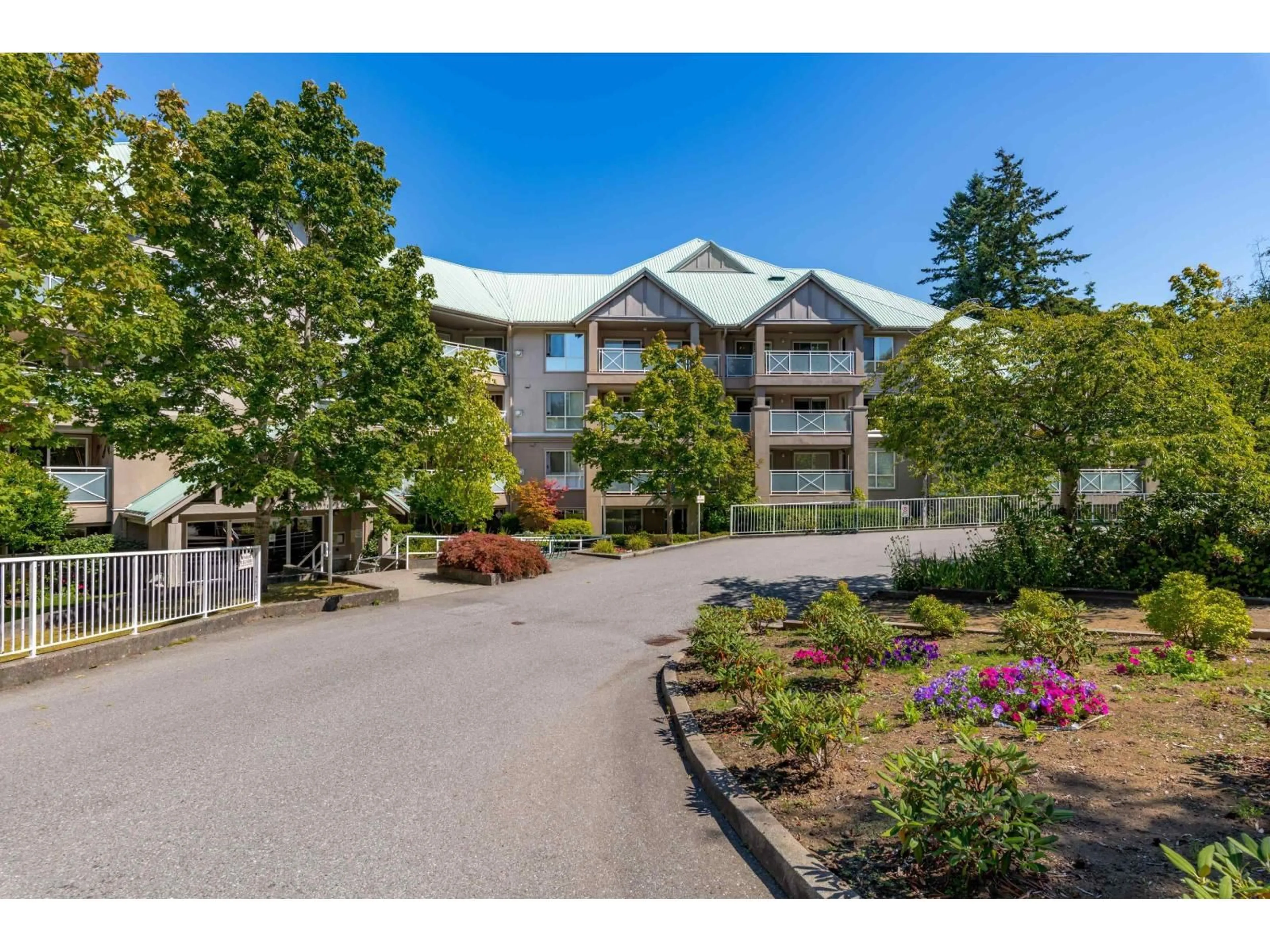 A pic from outside/outdoor area/front of a property/back of a property/a pic from drone, unknown for 104 - 15150 29A AVENUE, Surrey British Columbia V4P3B1