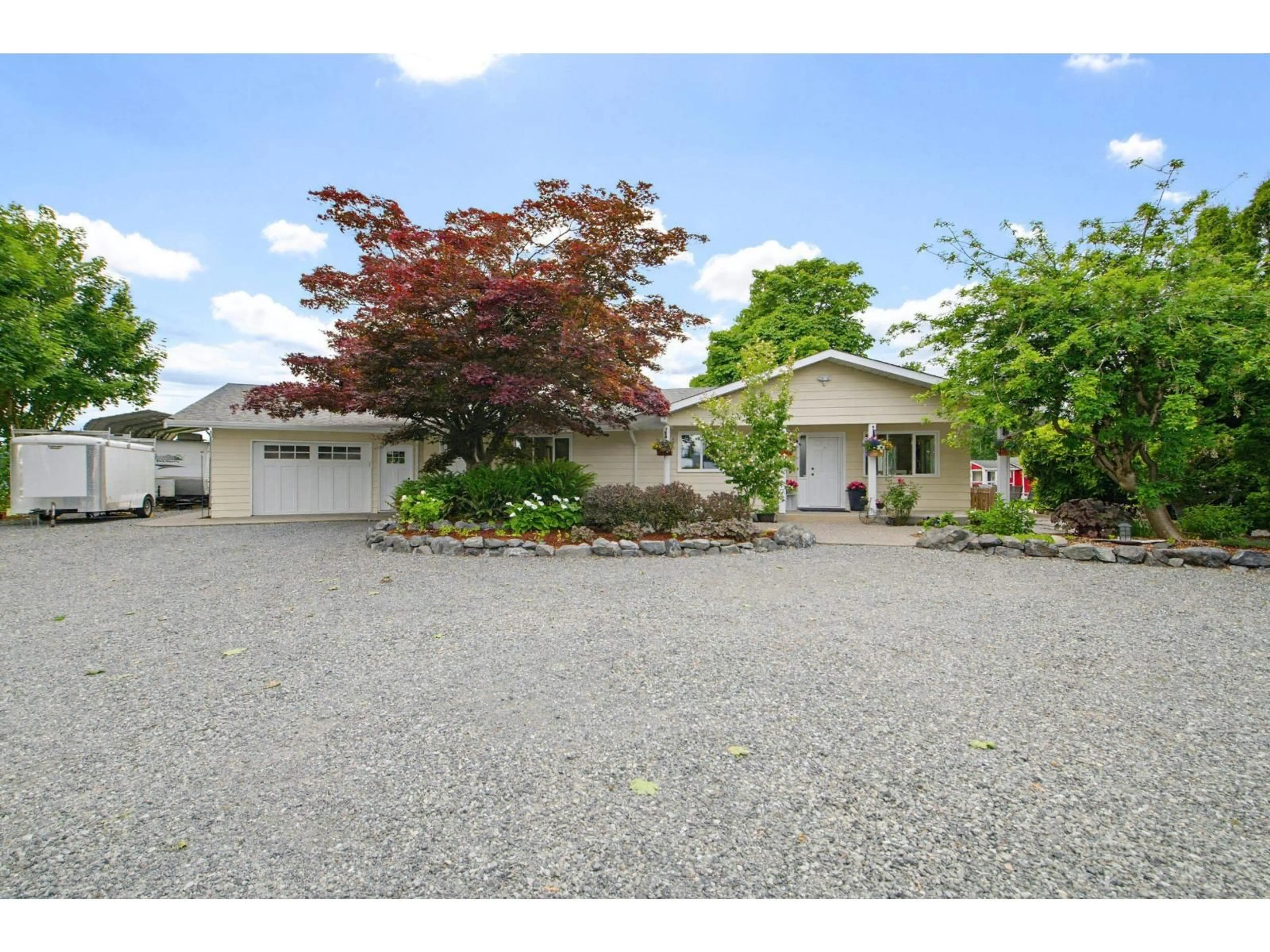 A pic from outside/outdoor area/front of a property/back of a property/a pic from drone, street for 6085 BRADNER ROAD, Abbotsford British Columbia V4X2C7