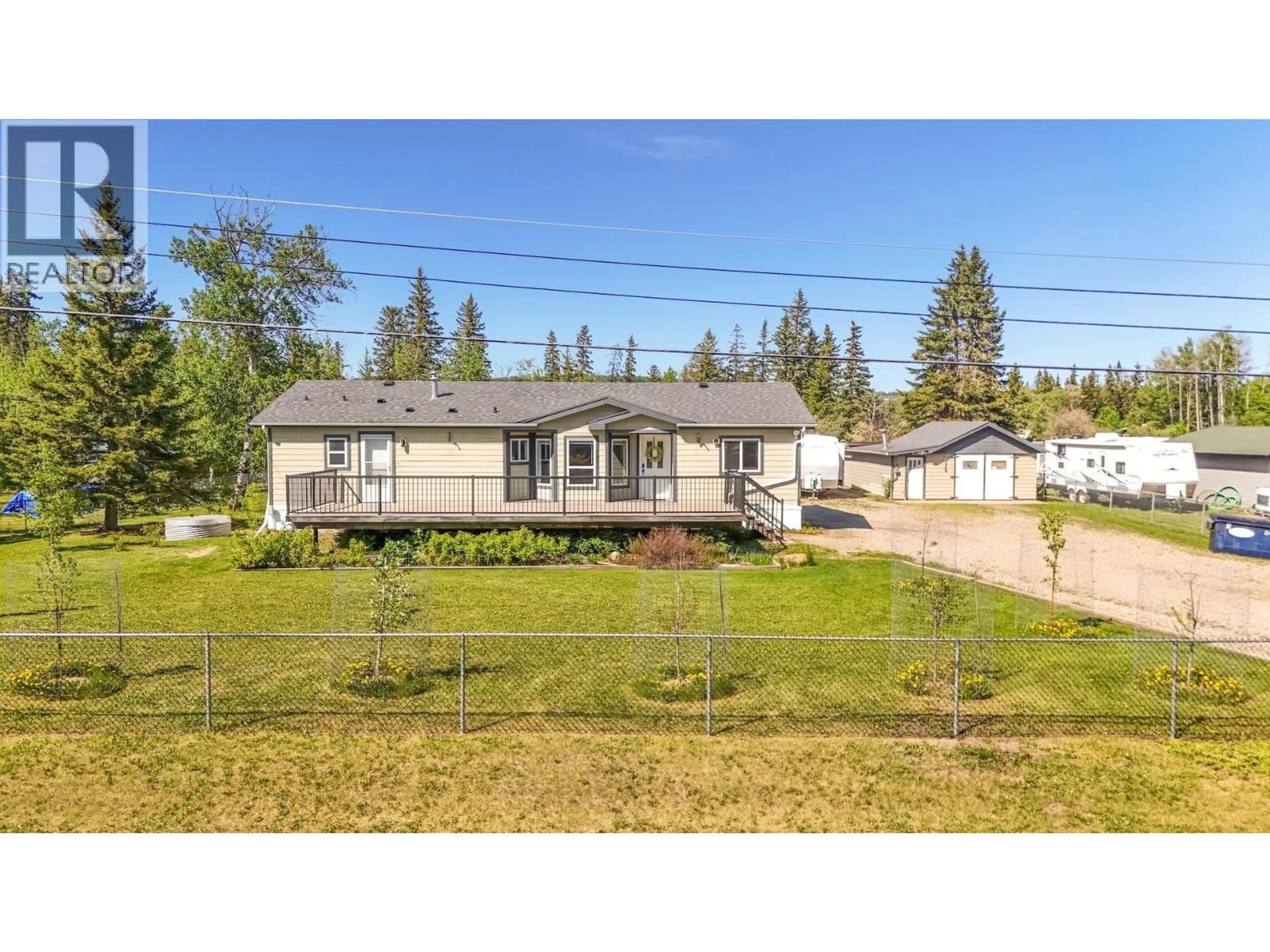 A pic from outside/outdoor area/front of a property/back of a property/a pic from drone, street for 12222 JUNIPER AVENUE, Fort St. John British Columbia V1J8E5