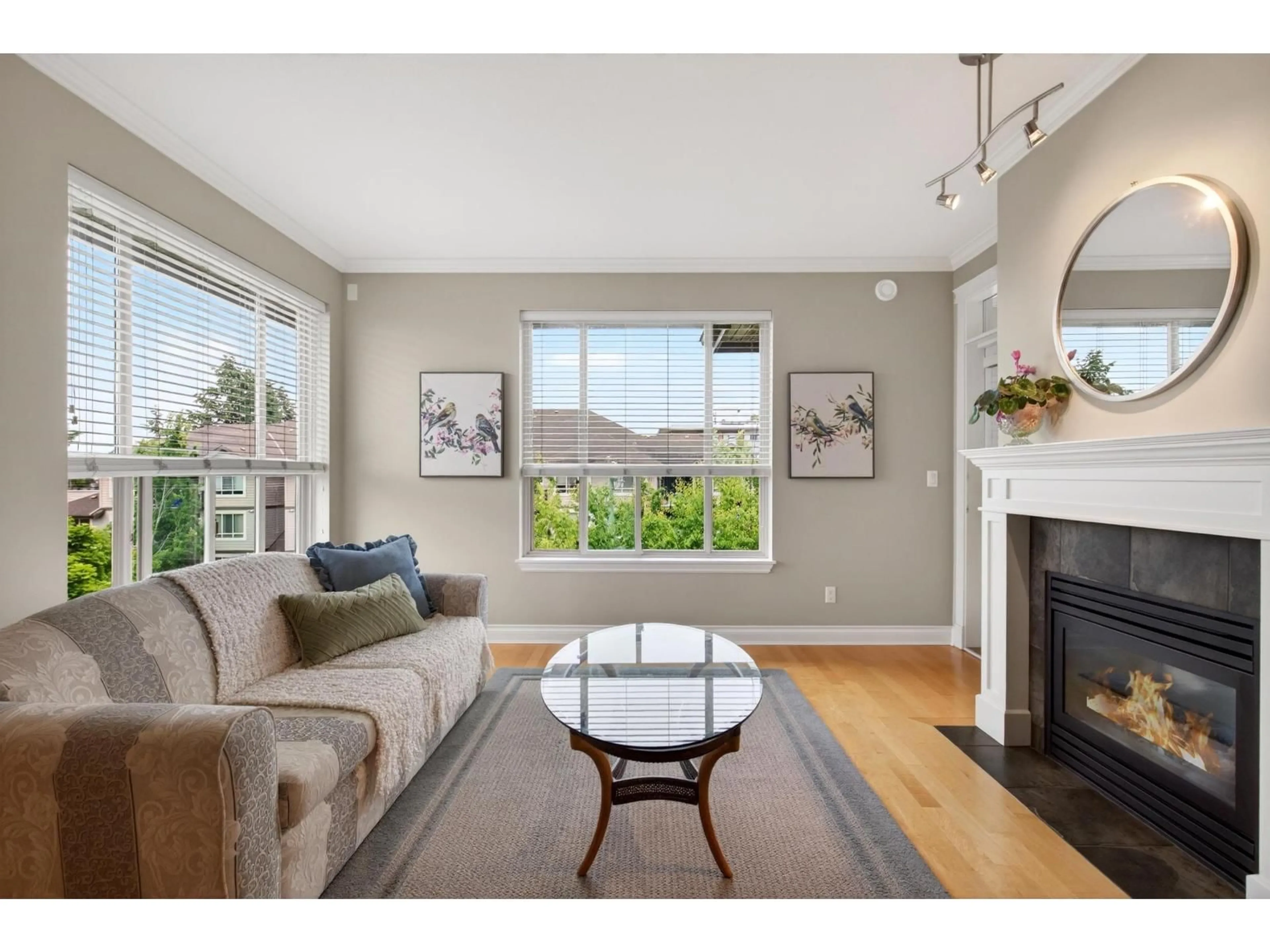 Living room with furniture, wood/laminate floor for 403 - 15357 17A AVENUE, Surrey British Columbia V4A1V4