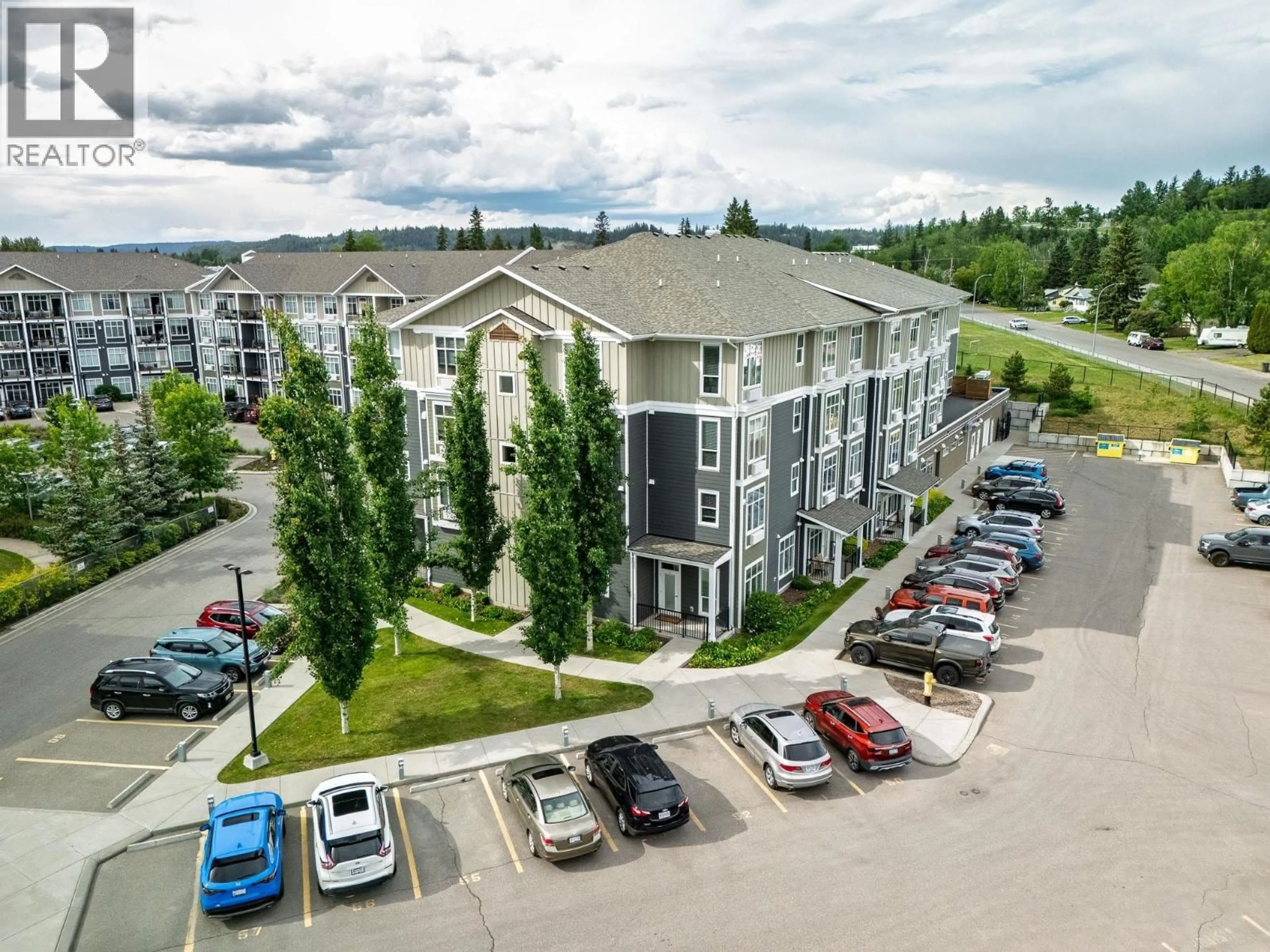 A pic from outside/outdoor area/front of a property/back of a property/a pic from drone, mountain view for 105 - 1444 20TH AVENUE, Prince George British Columbia V2L0C9