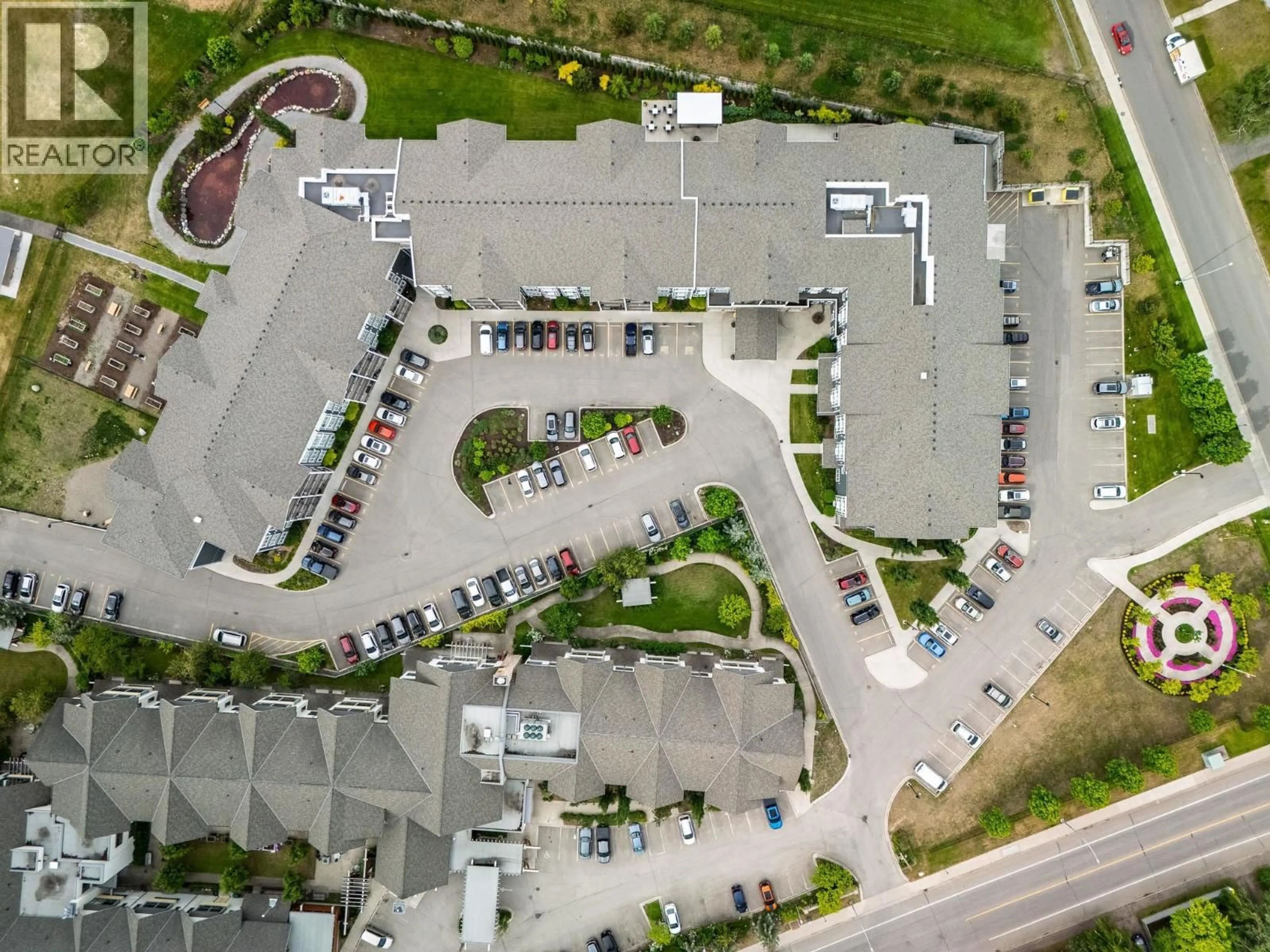 A pic from outside/outdoor area/front of a property/back of a property/a pic from drone, street for 105 - 1444 20TH AVENUE, Prince George British Columbia V2L0C9