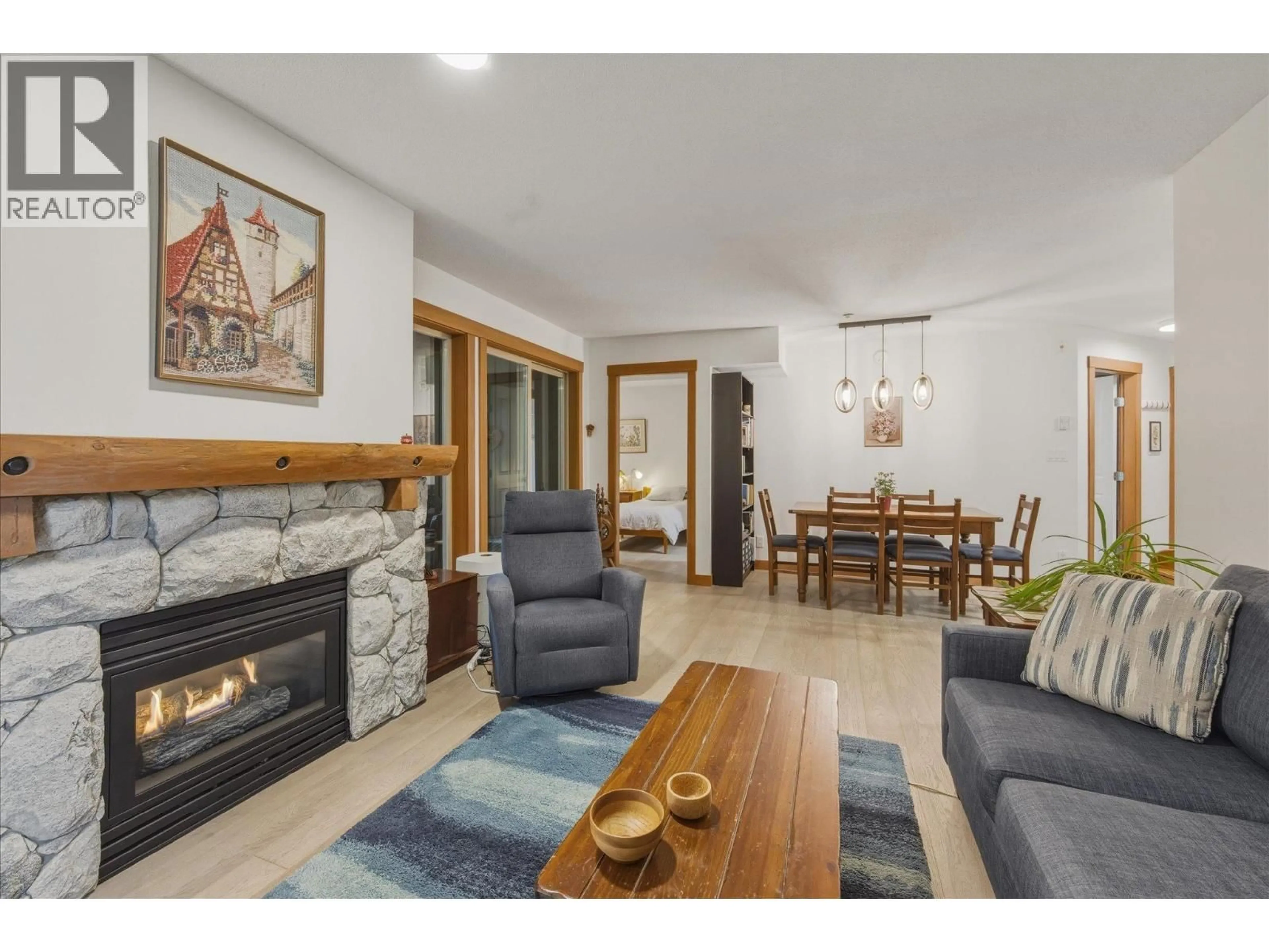 Living room with furniture, wood/laminate floor for 325 - 4660 BLACKCOMB WAY, Whistler British Columbia V0N1B4